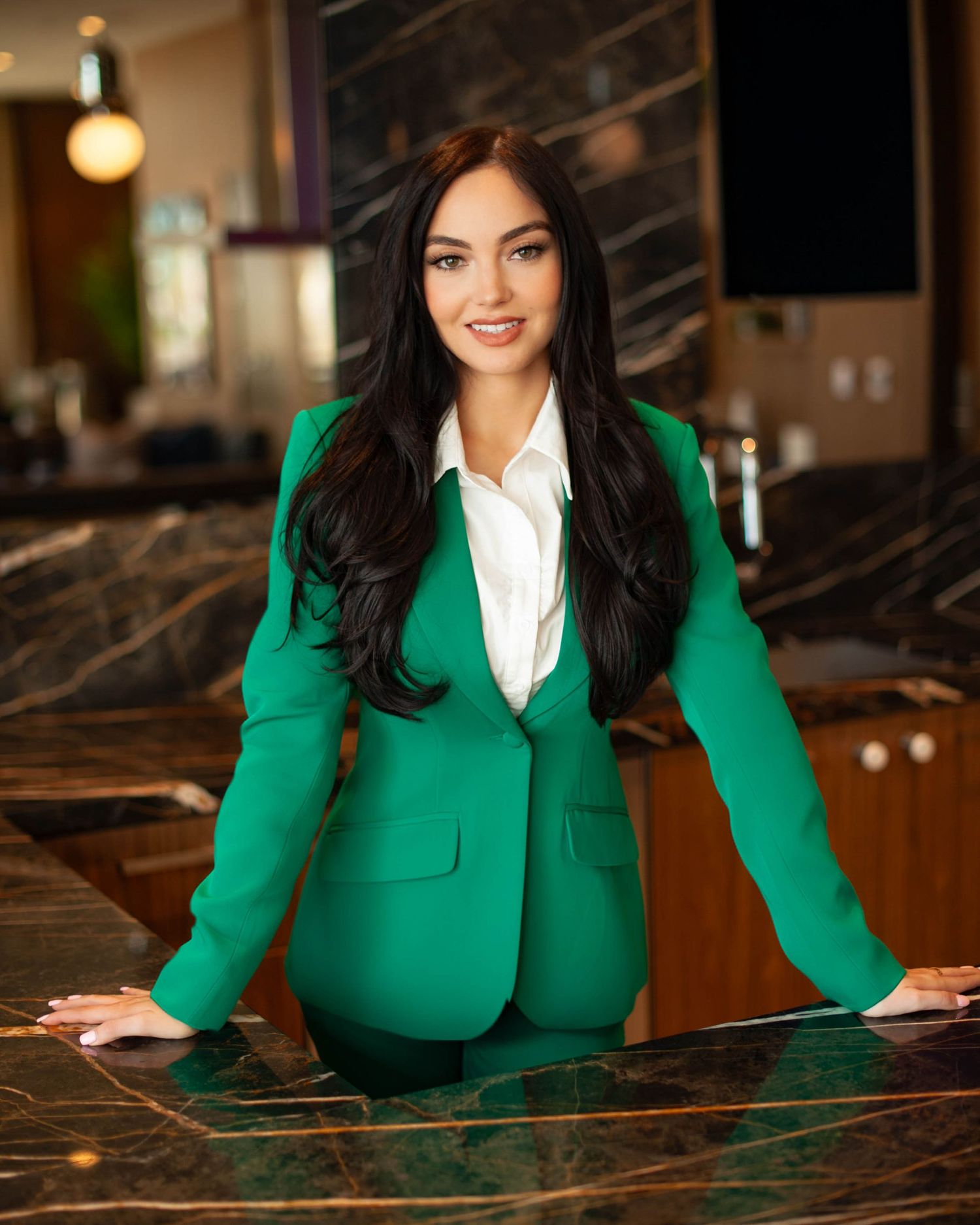 Senior portrait — young woman in elegant green outfit, professional senior photos Bay Area
