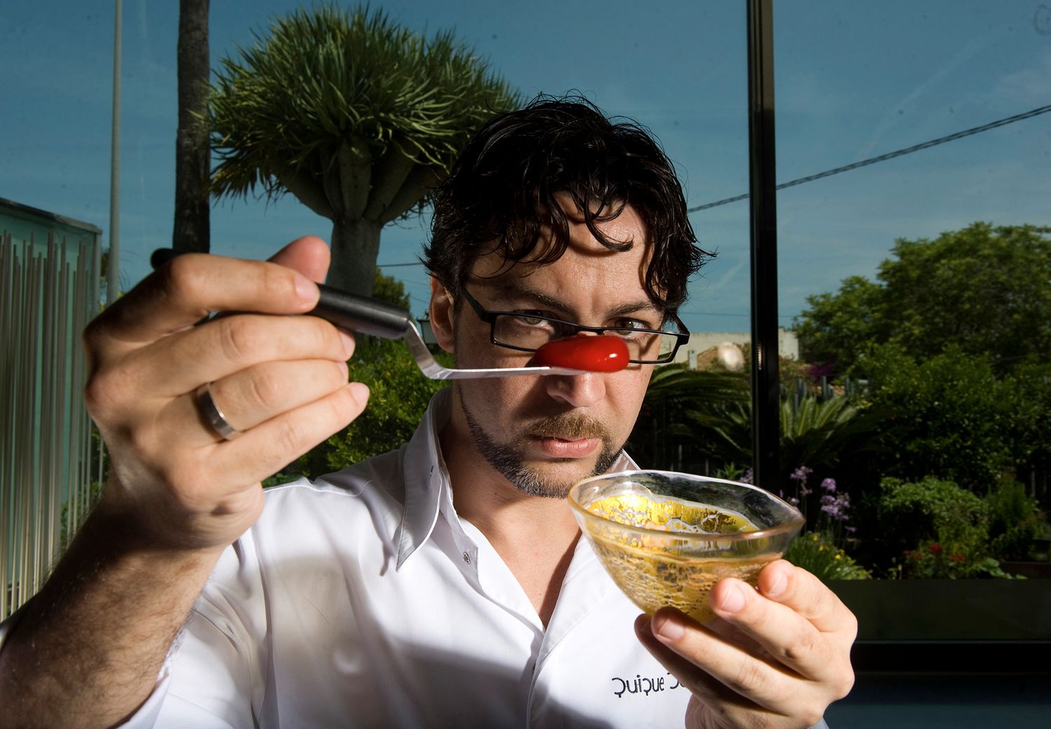 Chef Quique Dacosta prepares his Gamba y tres servicios dish in his creative studio at his restaurant in Denia, Spain