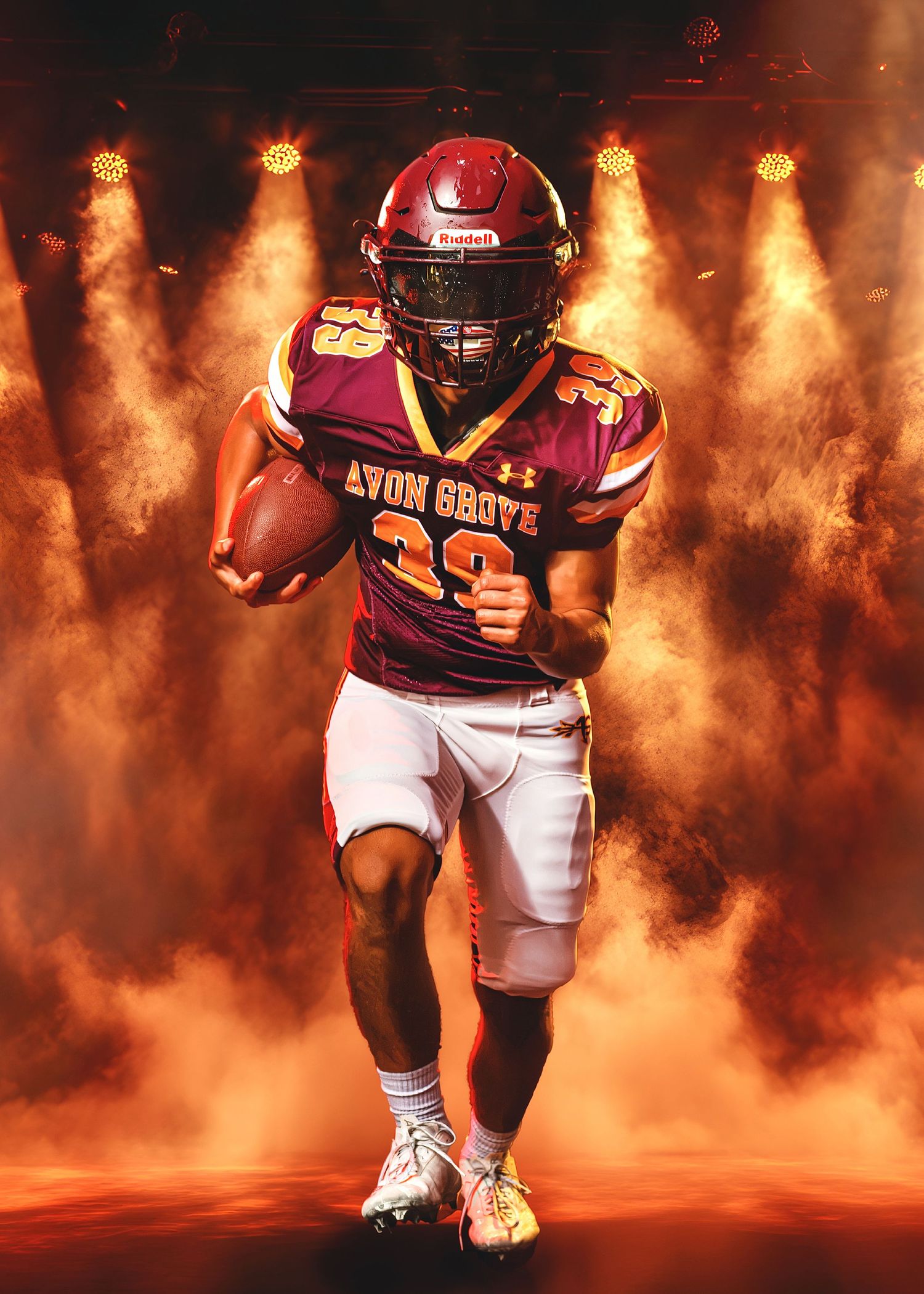Avon Grove #39 football player runs through dramatic orange smoke and stadium lights.