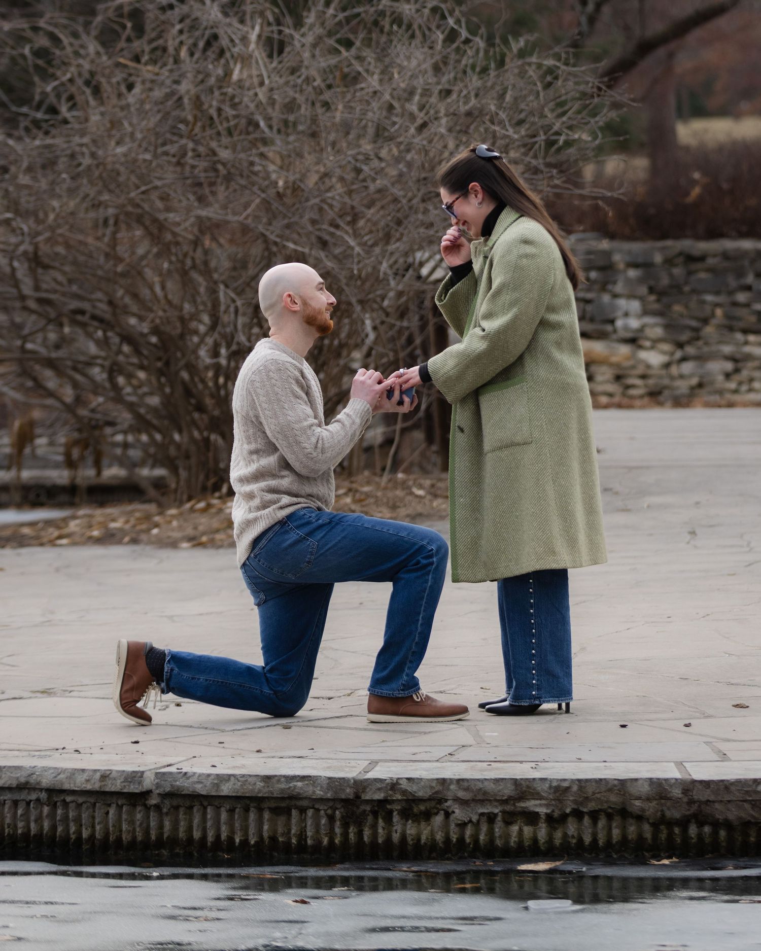 Photo of a couple during marriage proposal at Loose Park in Kansas City | Kansas City Northland Portrait Photographer