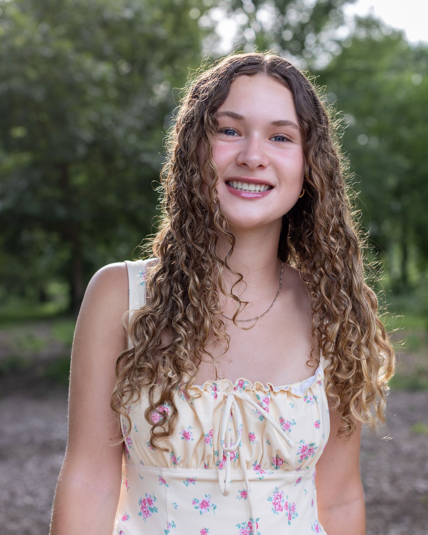 Senior portrait backlit photo of a young lady at Sullivan Nature Sanctuary in Parkville | Kansas City Northland Portrait Photographer