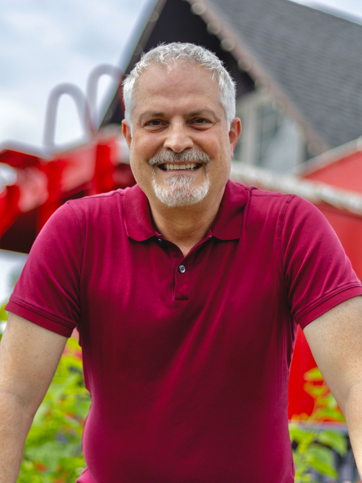 Kansas City portrait photography. Photo of John Mink, owner of John Mink Photography, smiling and looking at camera.