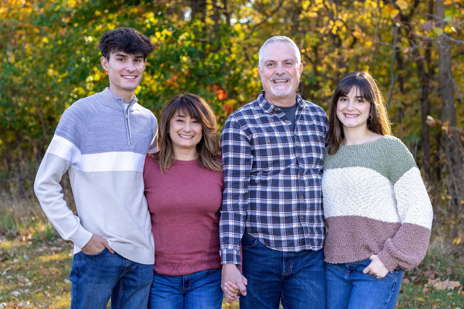 Portrait of a family standing together at Line Creek Trail in KC Northland | Kansas City Northland Portrait Photographer