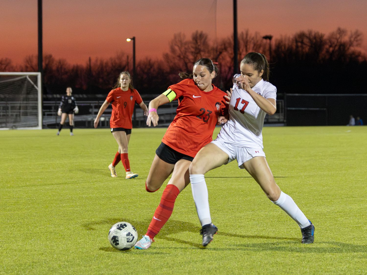 Sports action photo of female soccer players at Park Hill South High School Kansas City | Kansas City Northland Portrait Photographer