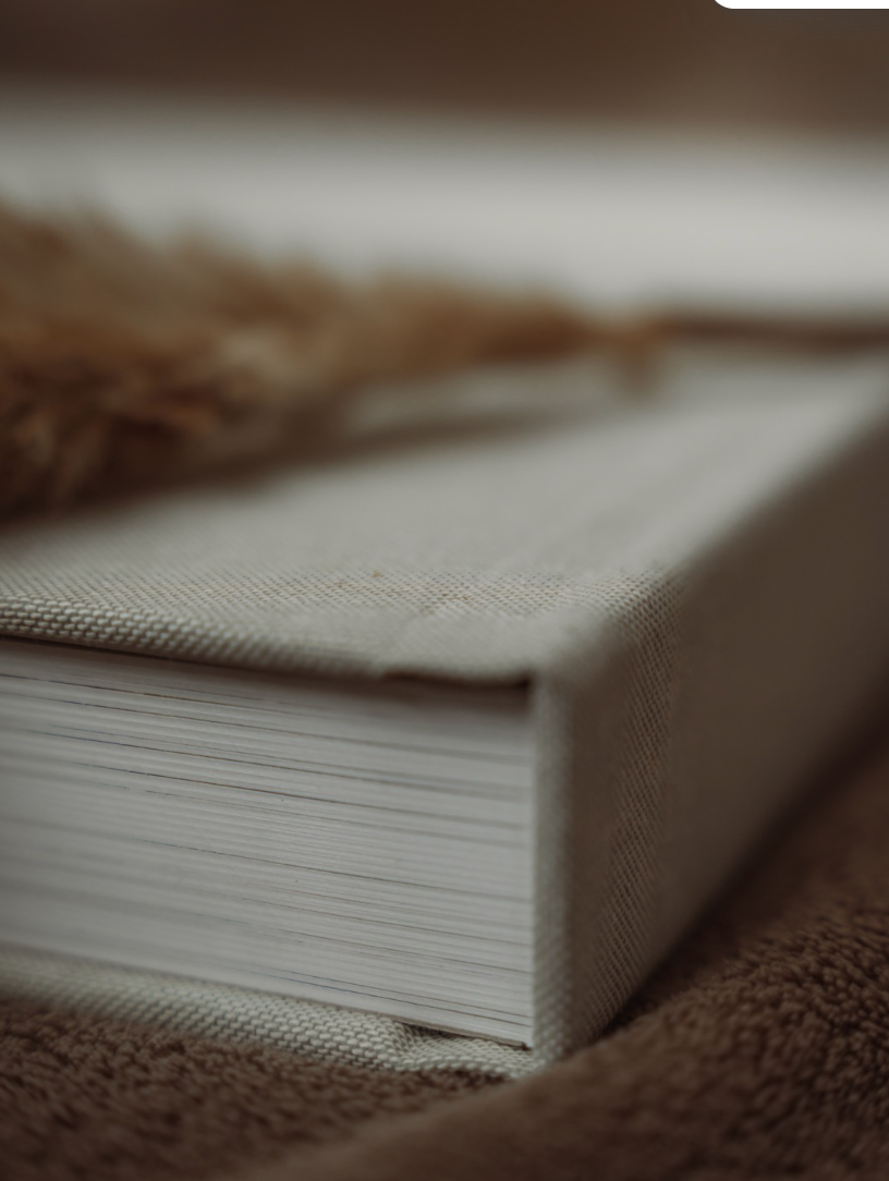 Close-up detail of stacked paper pages with shallow depth of field.