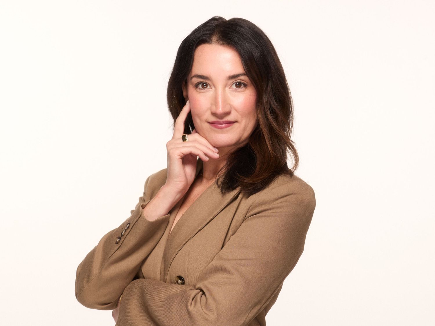 Professional branding headshot of a businesswoman in a tan blazer, Eugene Oregon photographer