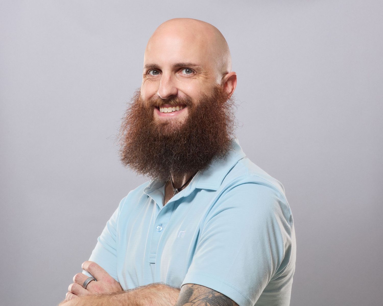 Professional branding linkedin headshot of an entrepreneur in a blue polo, Eugene Oregon photographer
