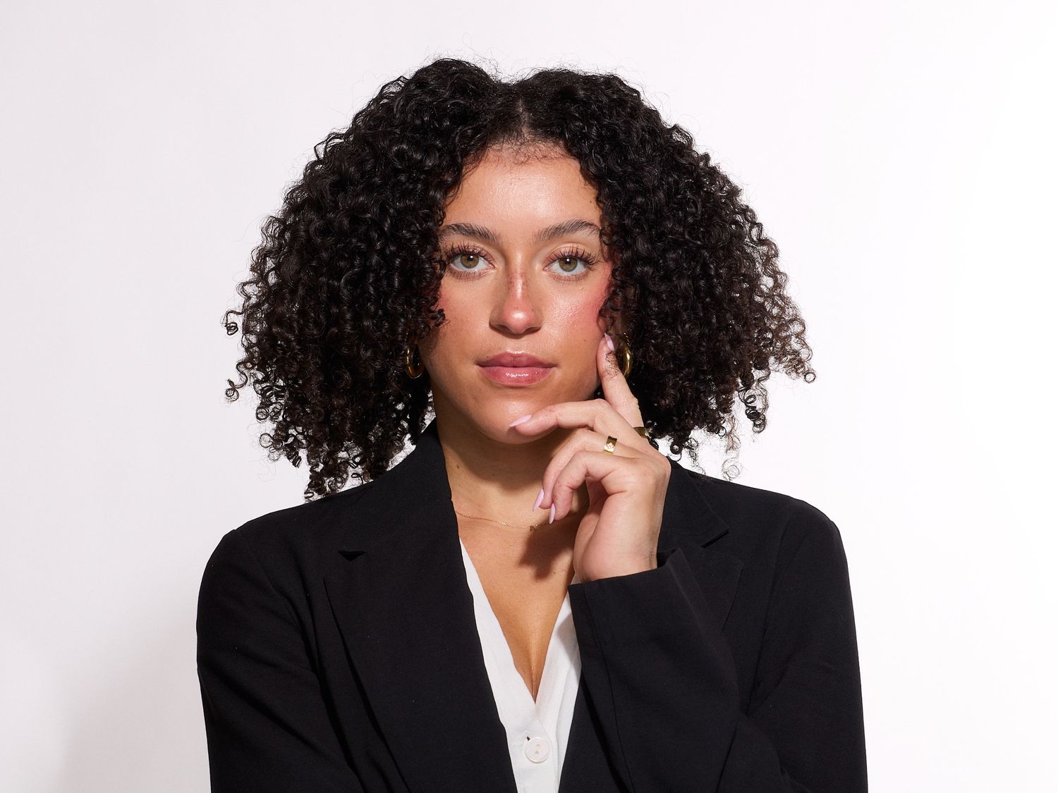 Corporate headshot of a woman in a black blazer for personal branding, Eugene Oregon