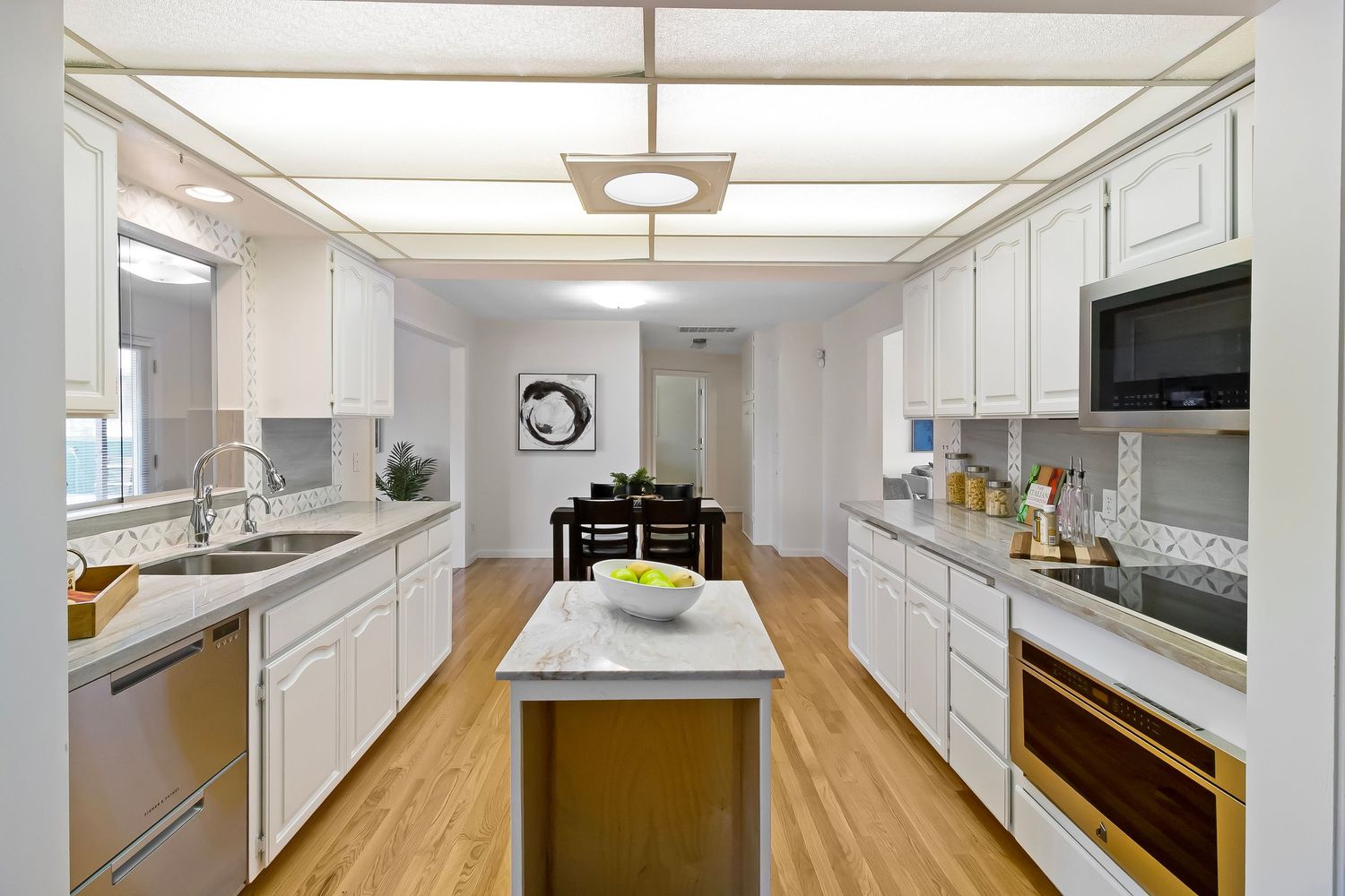 Commercial interior photography for hospitality and real estate spaces featuring clean, modern kitchen area