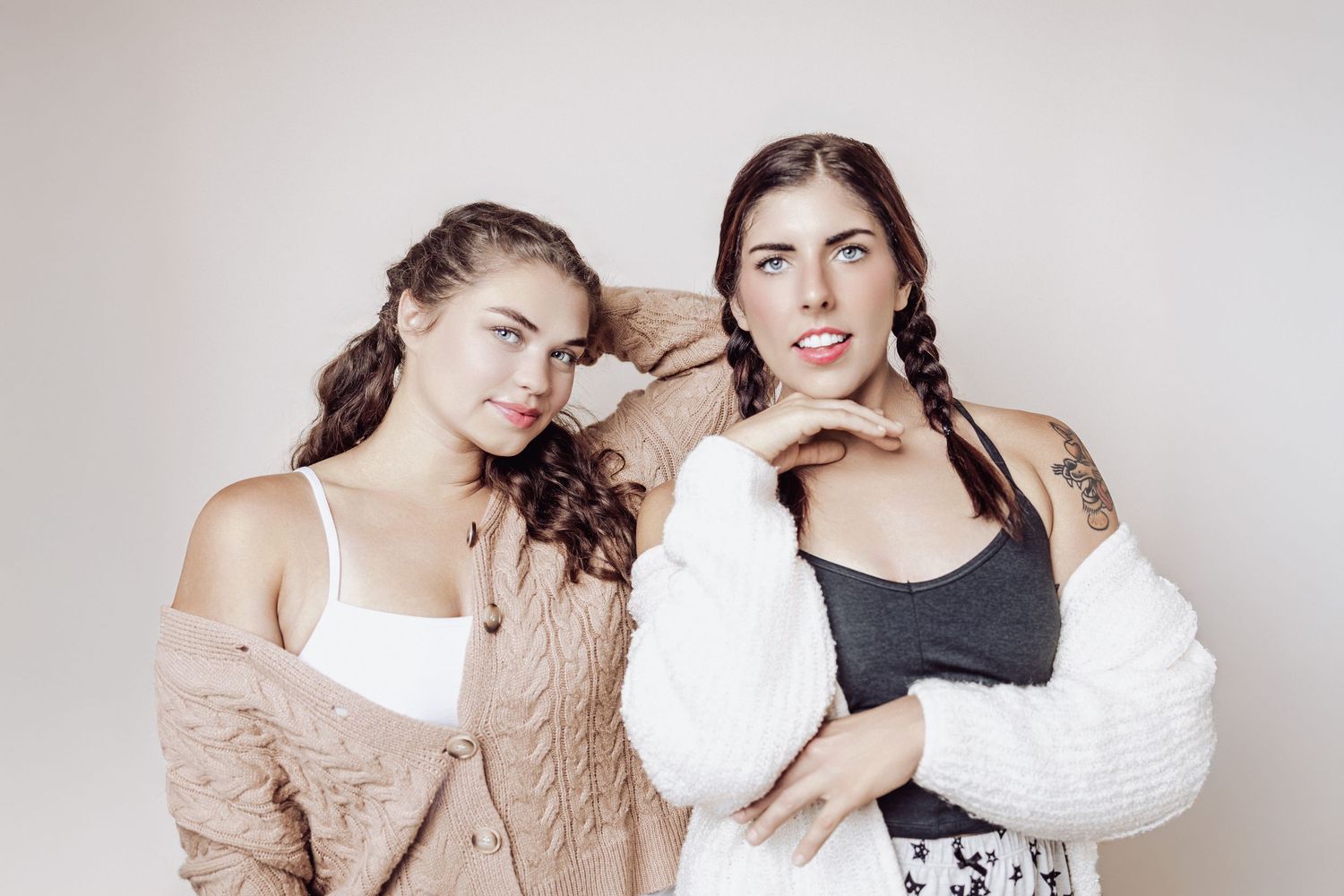Fashion portrait series with neutral tones against white backdrop.
