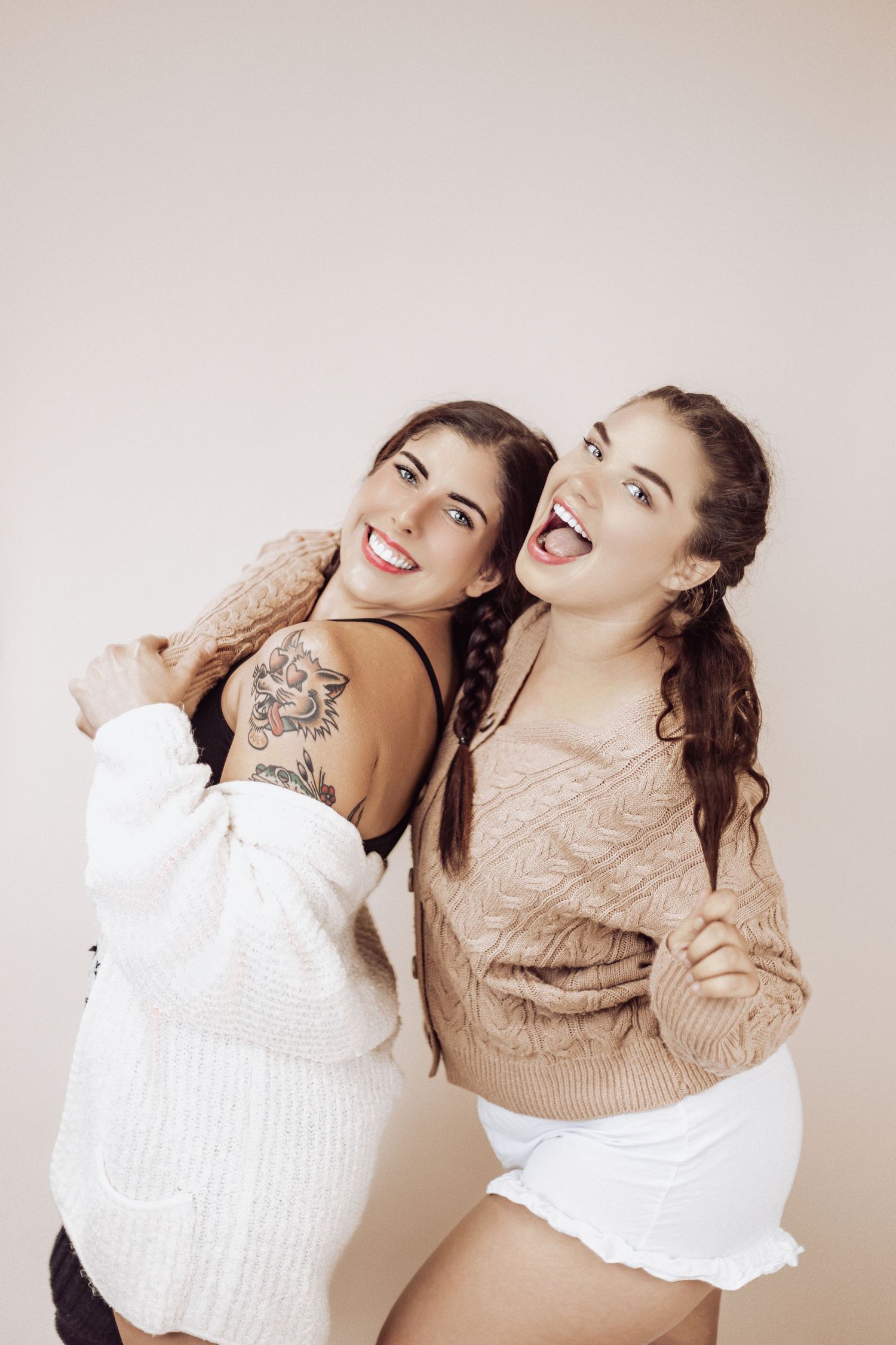 Lifestyle portrait series showing joyful laughter against white background.