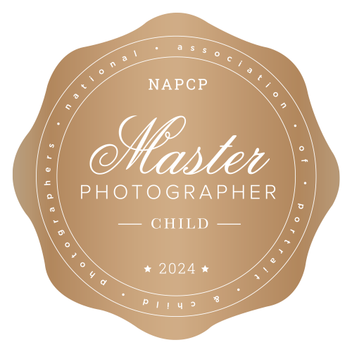 Certification badge from NAPCP for Master Child Photographer specialization.