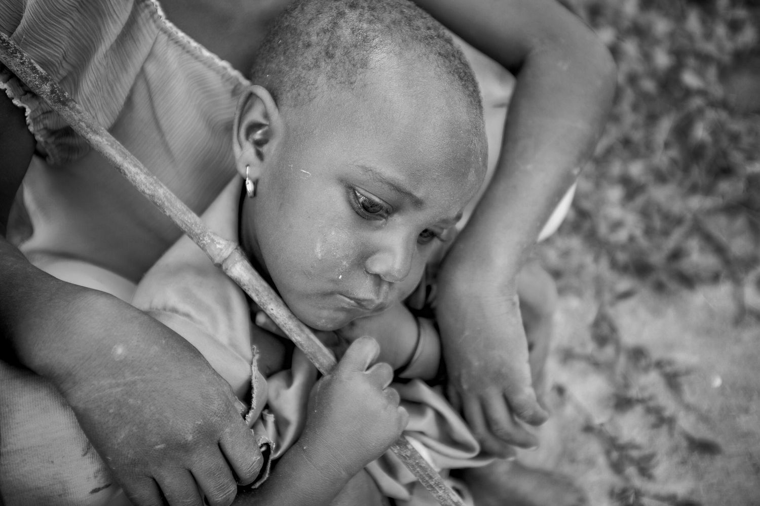 Close-up black and white portrait showing emotional connection.