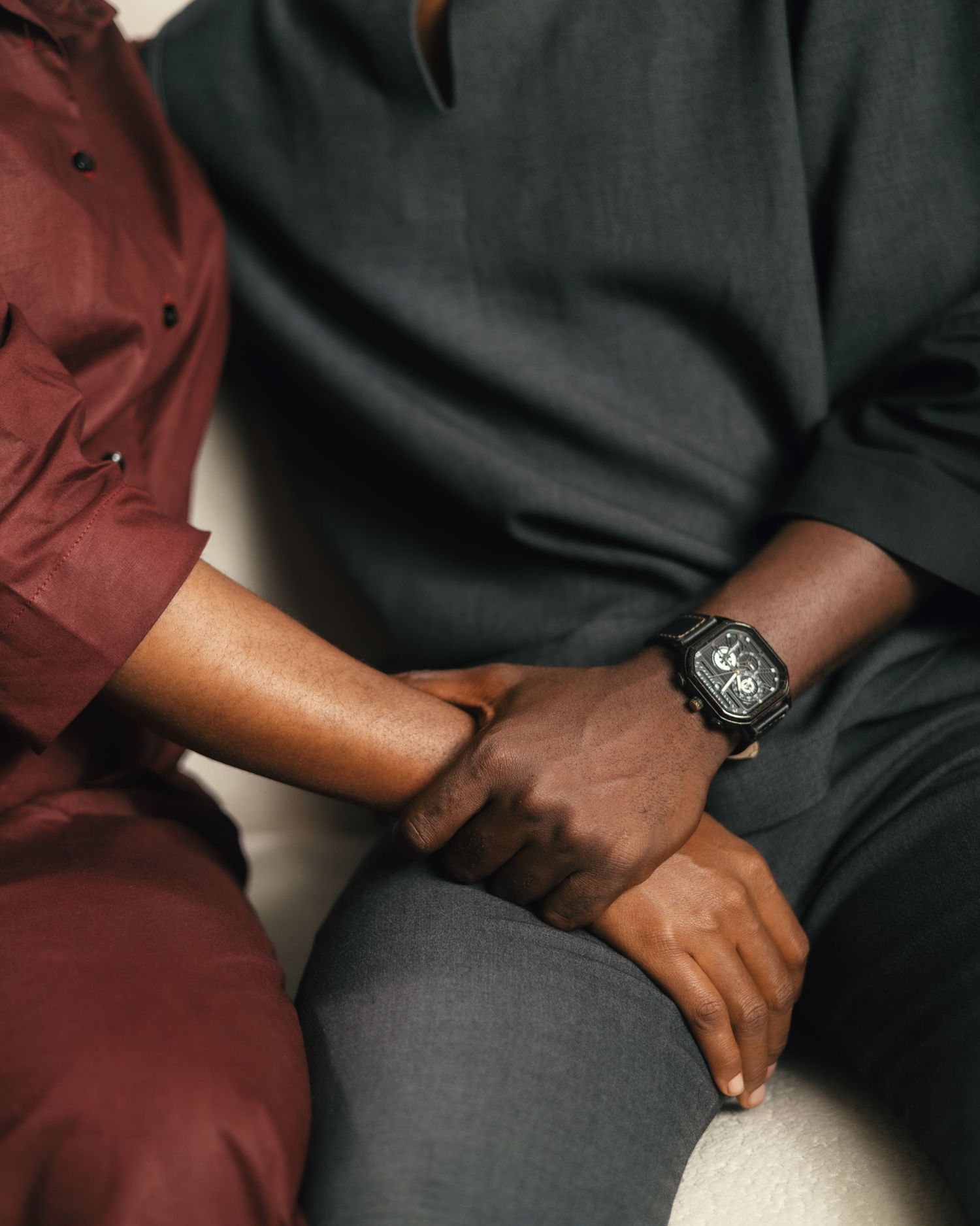 Detail shots of hands and formal wear during intimate couples portrait session.