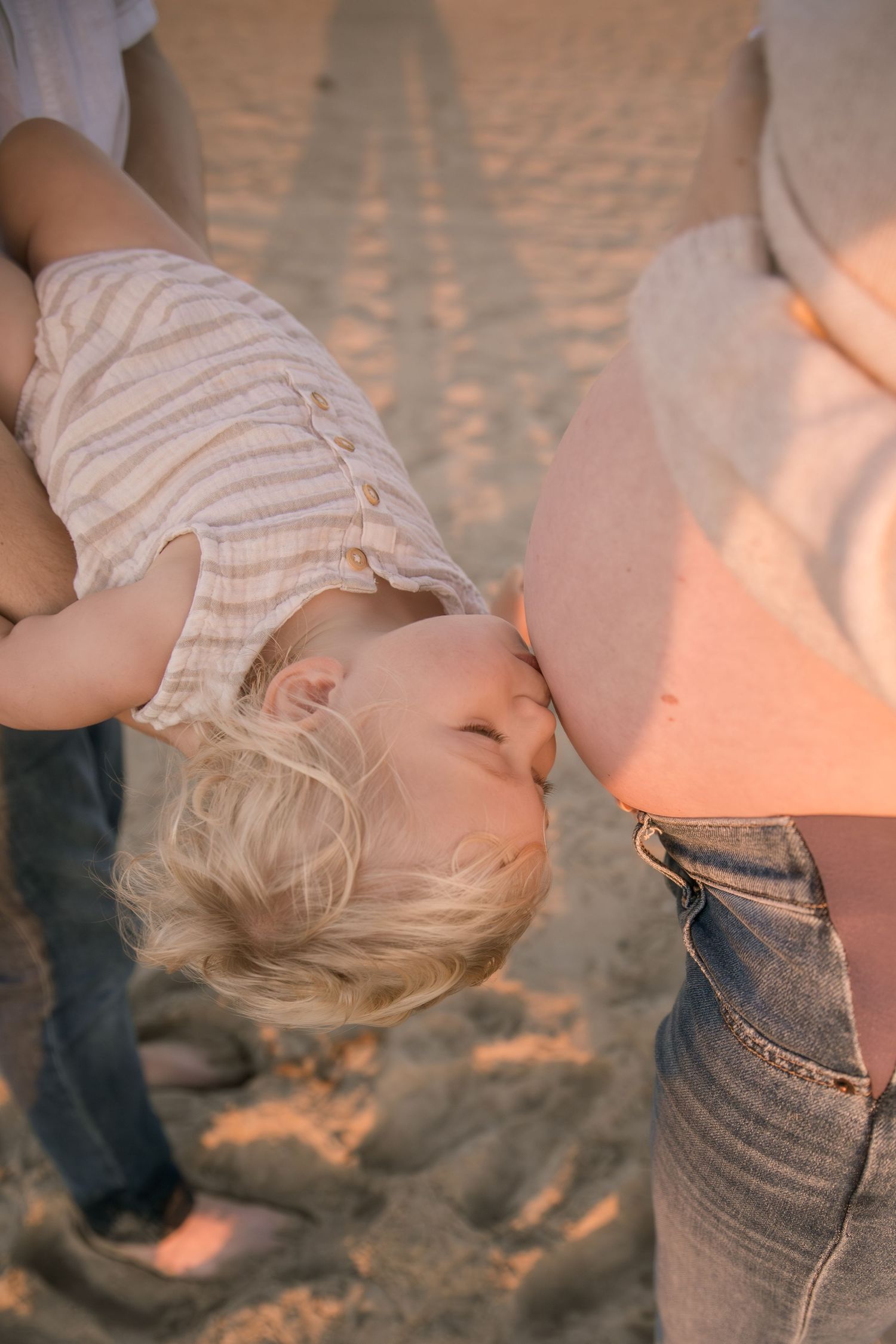 Playful beach photography sequence showing movement and emotion in warm evening light.