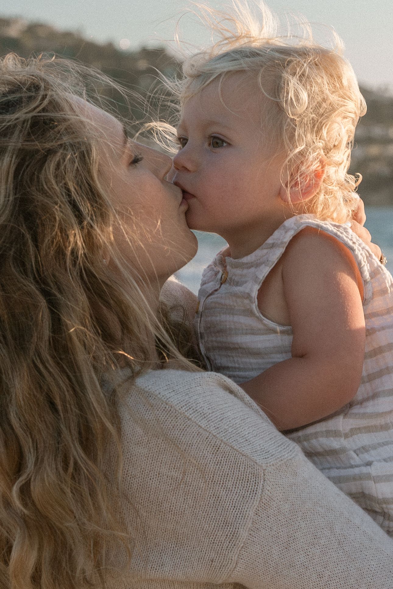 A tender moment captured in a series of close-up shots showing affectionate embraces at sunset.