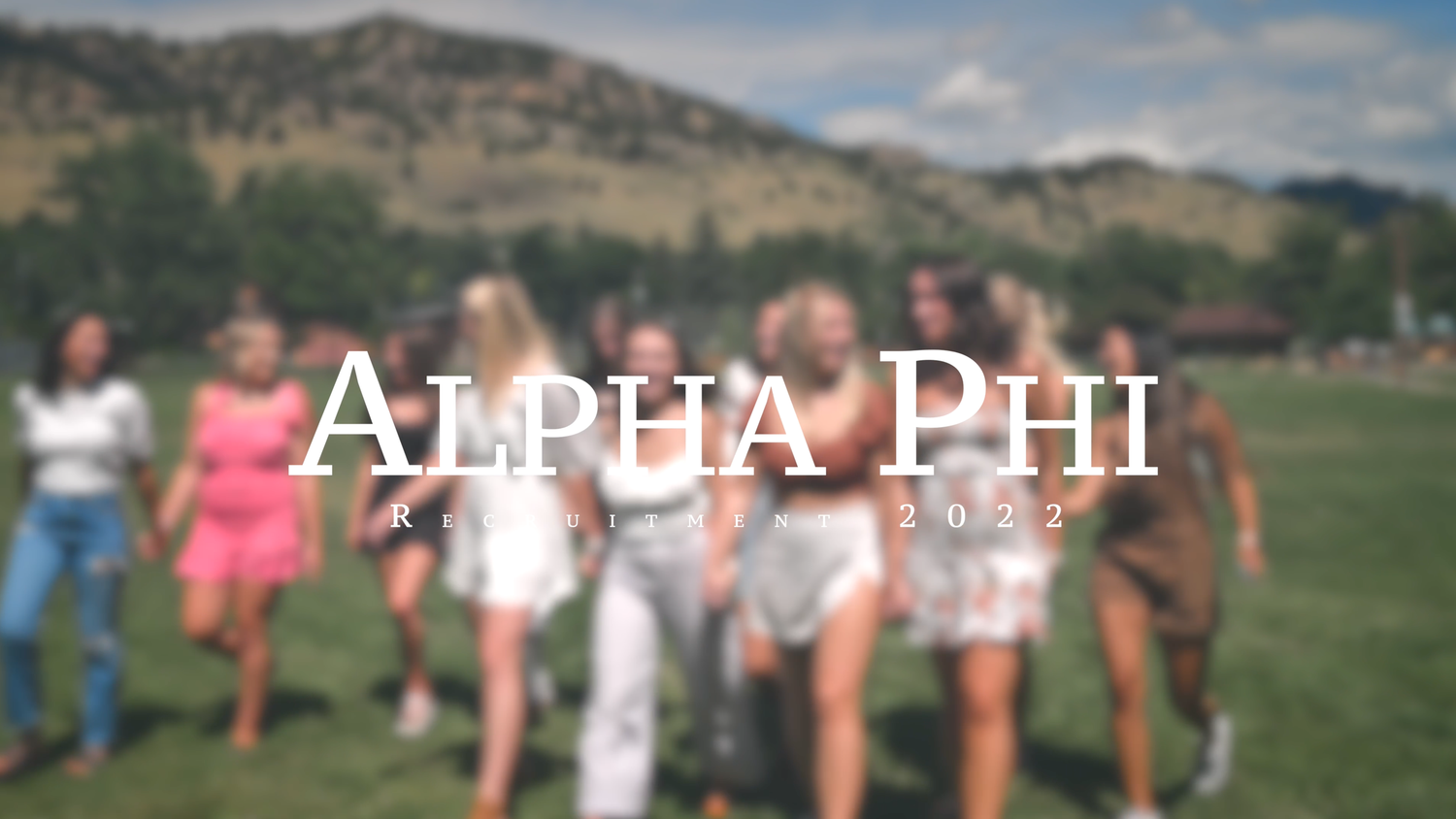 Alpha Phi sorority recruitment 2022 group photo outdoors with mountains in background.