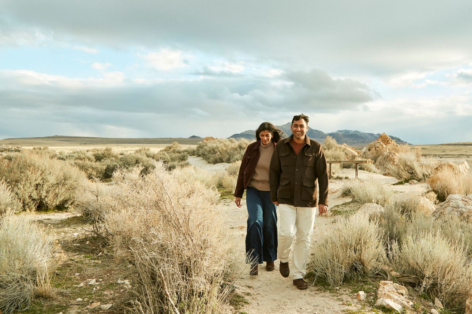 A series of desert landscape photos with sagebrush and mountains in the background under cloudy skies.