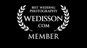 A horizontal row of five black and white award badges with laurel wreath designs for wedding photography and membership.