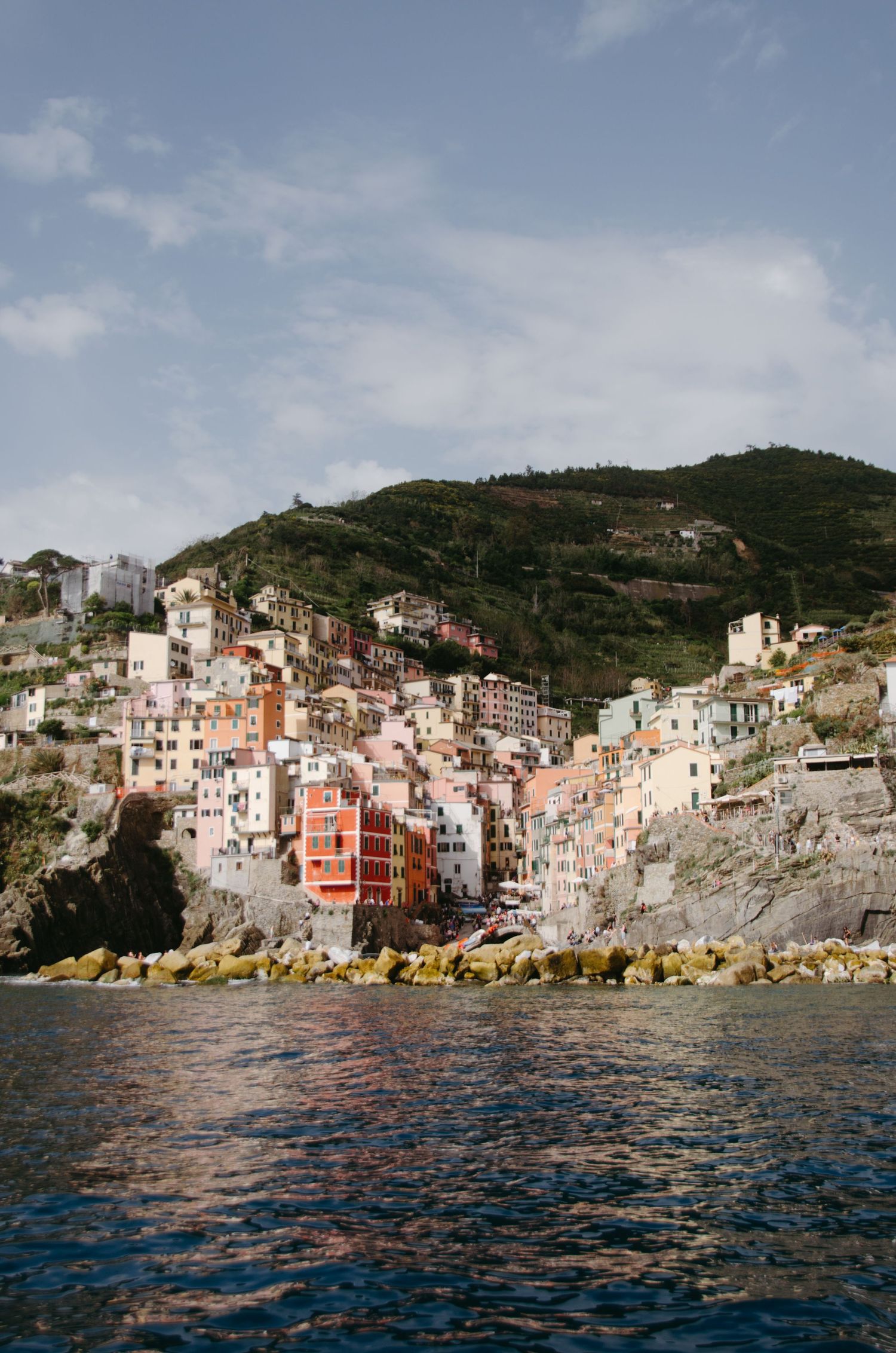 Colorful hillside houses of Cinque Terre village overlooking the Mediterranean Sea.
