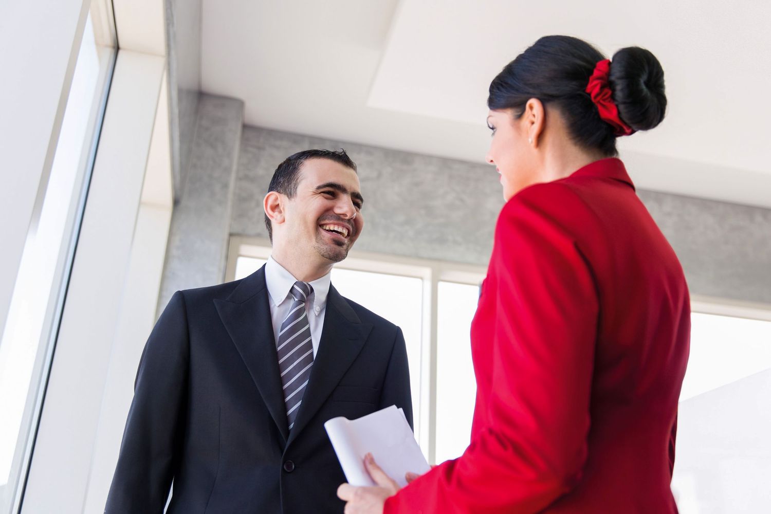 Corporate airline photography features uniformed staff in lifestyle visuals for use in both photography and video.