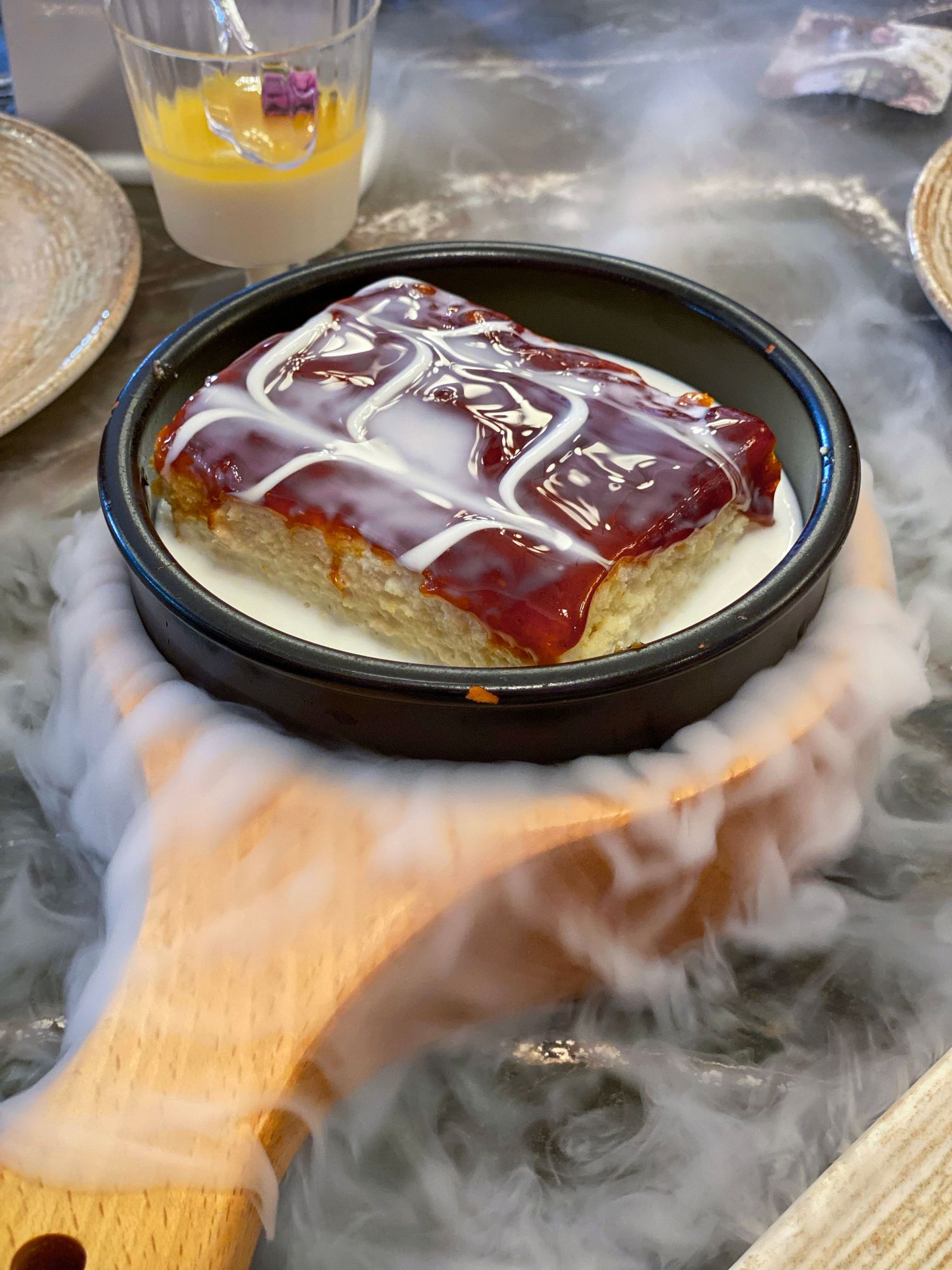 A sizzling fajita-style milk cake in a cast iron skillet create captivating visuals for creative content