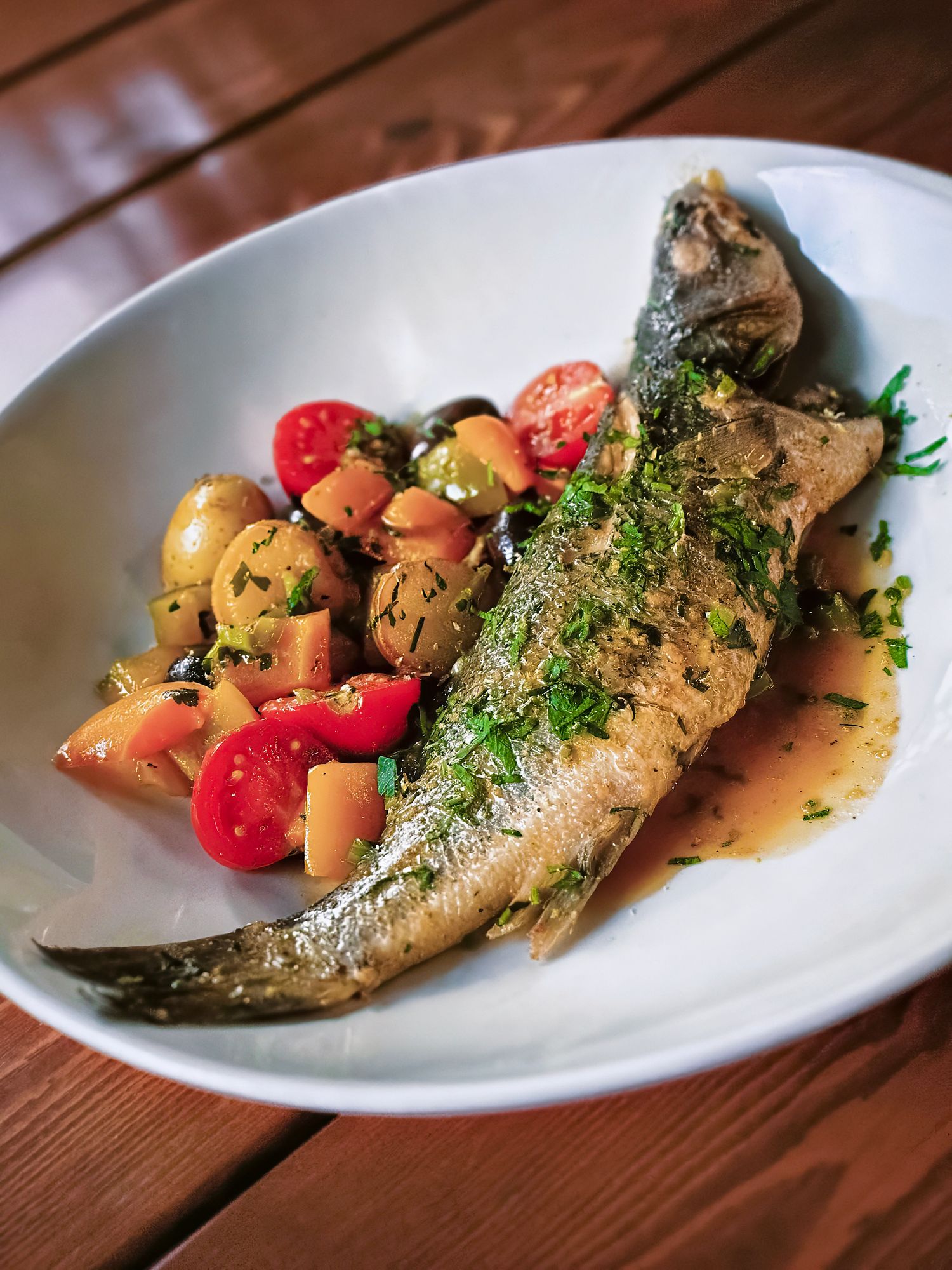 Whole grilled fish produced for creative visual content across photography and video platforms.