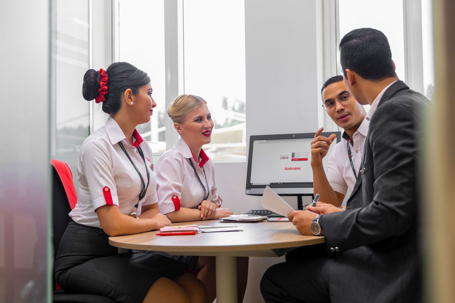 Airline crew team meeting captured for branded airline content and video storytelling.