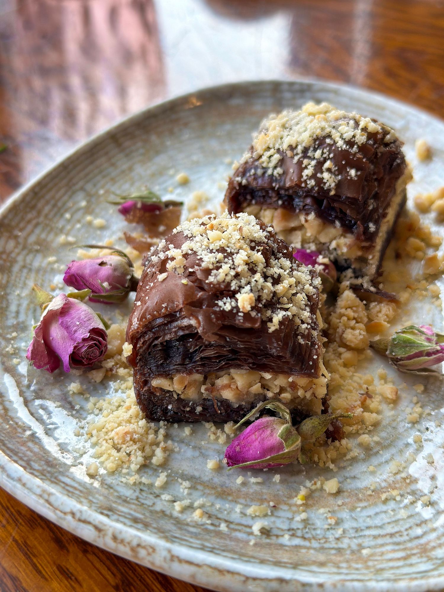 Chocolate baklava dessert photography with crumble topping for branded food media.