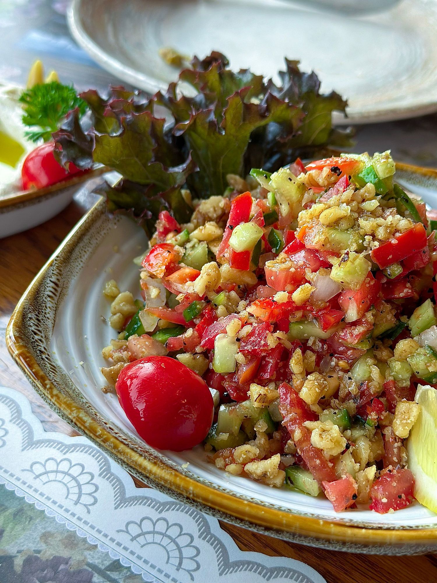 Vibrant food photography showcasing a quinoa salad with cherry tomatoes and fresh herbs, styled for food content