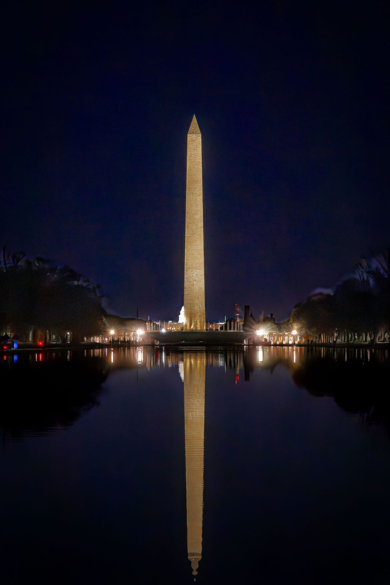 Washington Monument reflected in the Lincoln Memorial Reflecting Pool at night