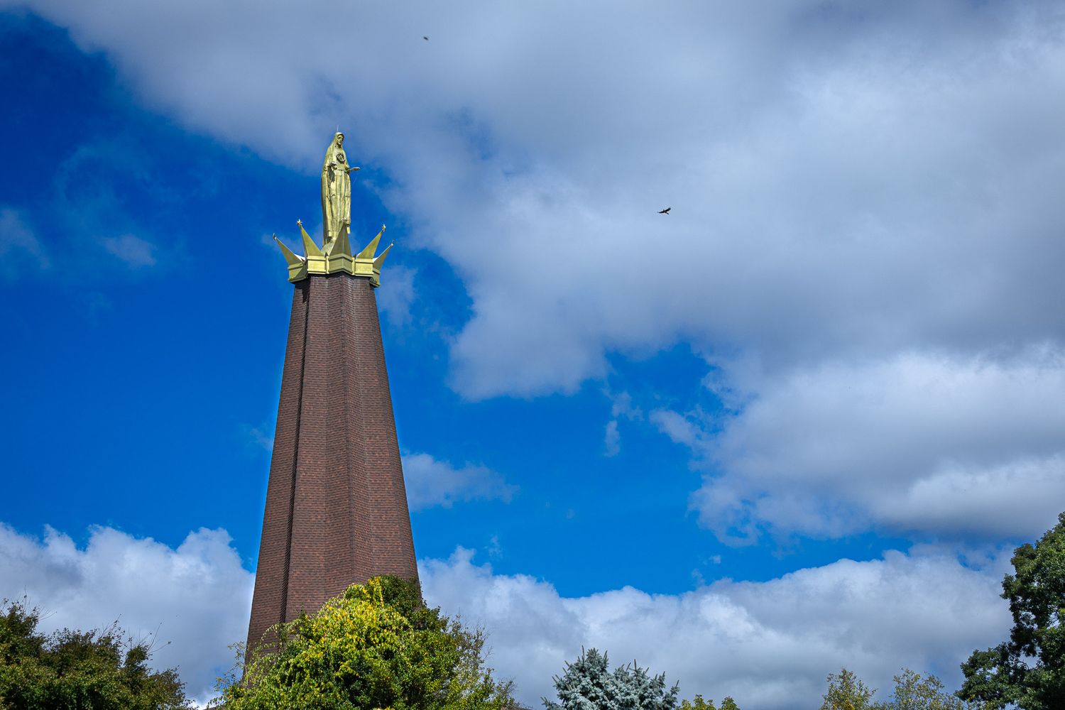 National Blue Army Shrine of Our Lady of Fatima in Washington, New Jersey, rising against a bright blue sky