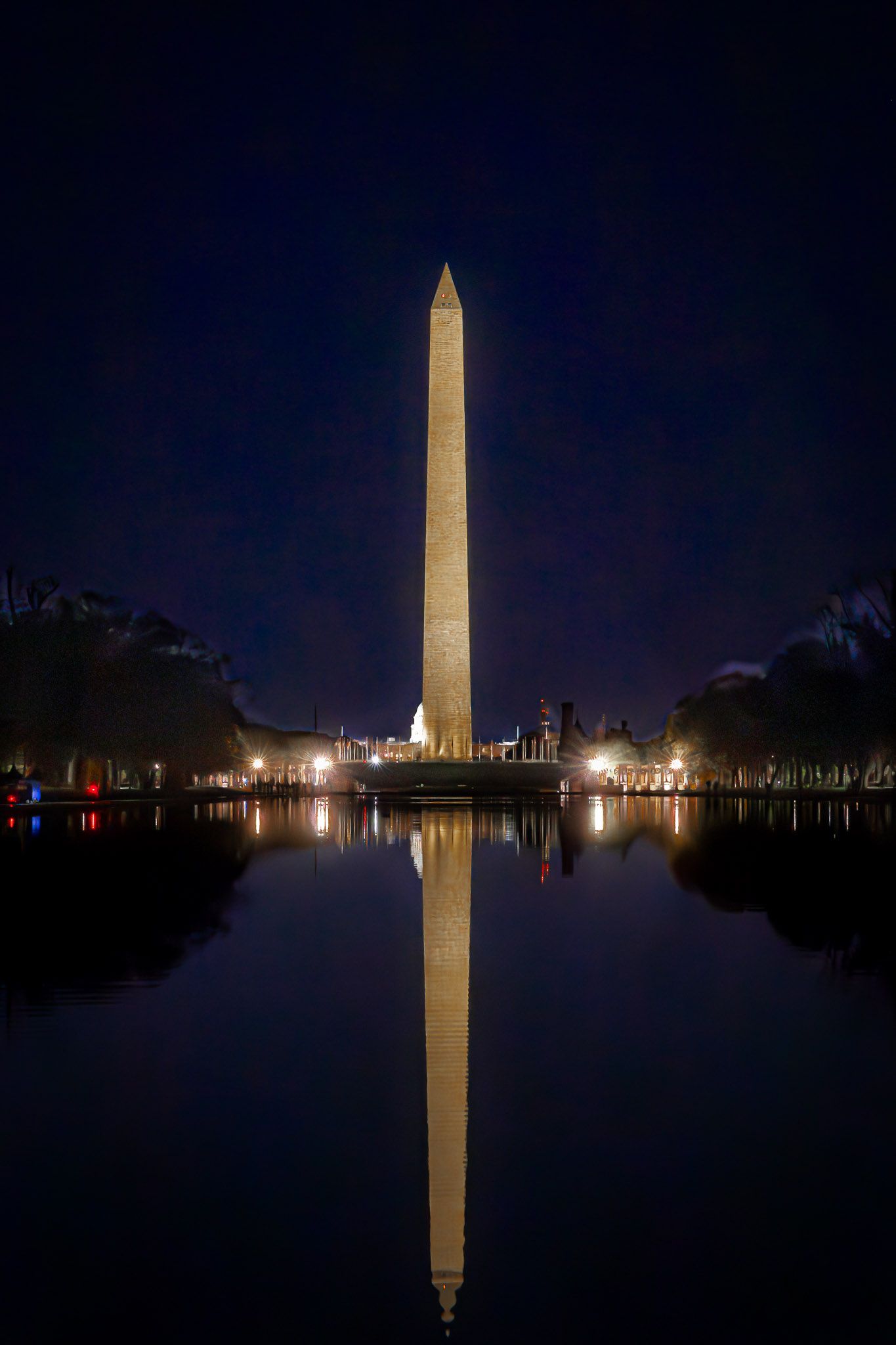 Washington Monument reflected in the Lincoln Memorial Reflecting Pool at night