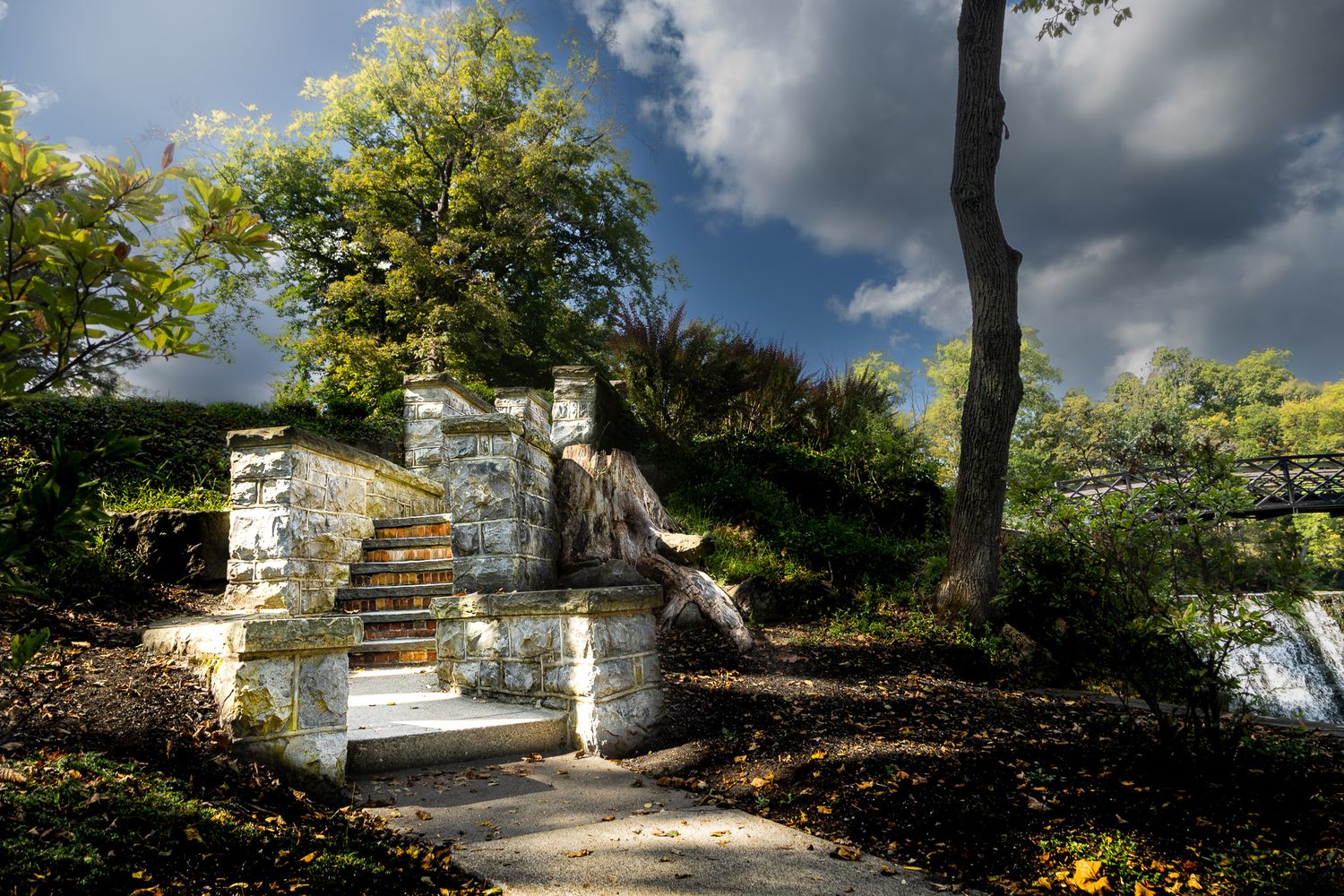 Historic stone staircase at Blair Academy in Blairstown, New Jersey framed by trees and autumn light.