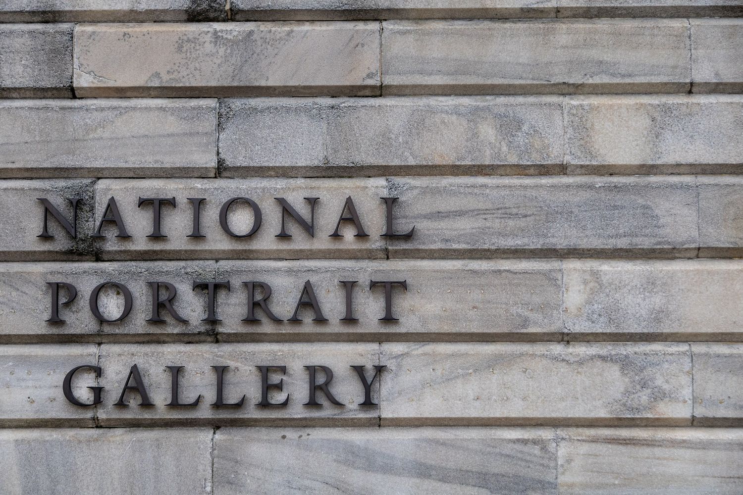 National Portrait Gallery and Smithsonian American Art Museum exterior signage in Washington DC.