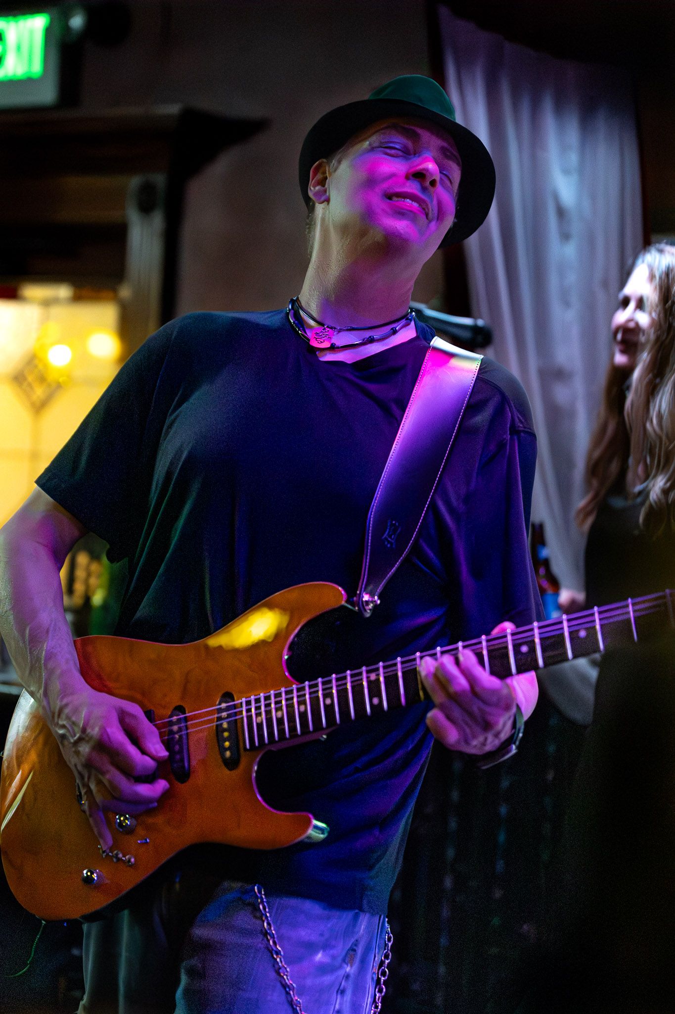 Lead guitarist playing live during a performance by The Wrecks.