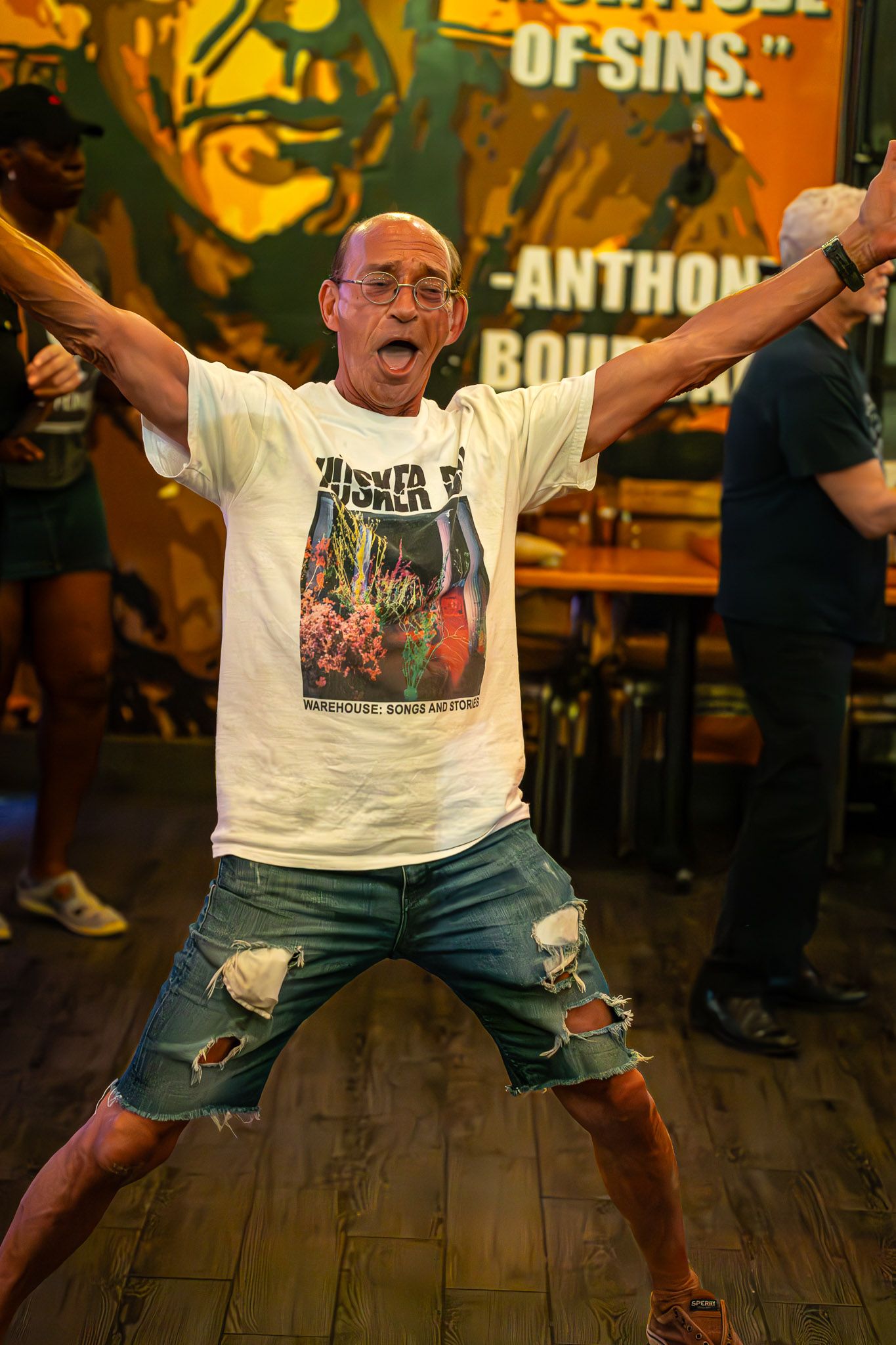 Audience member celebrating during a live performance by The Wrecks.