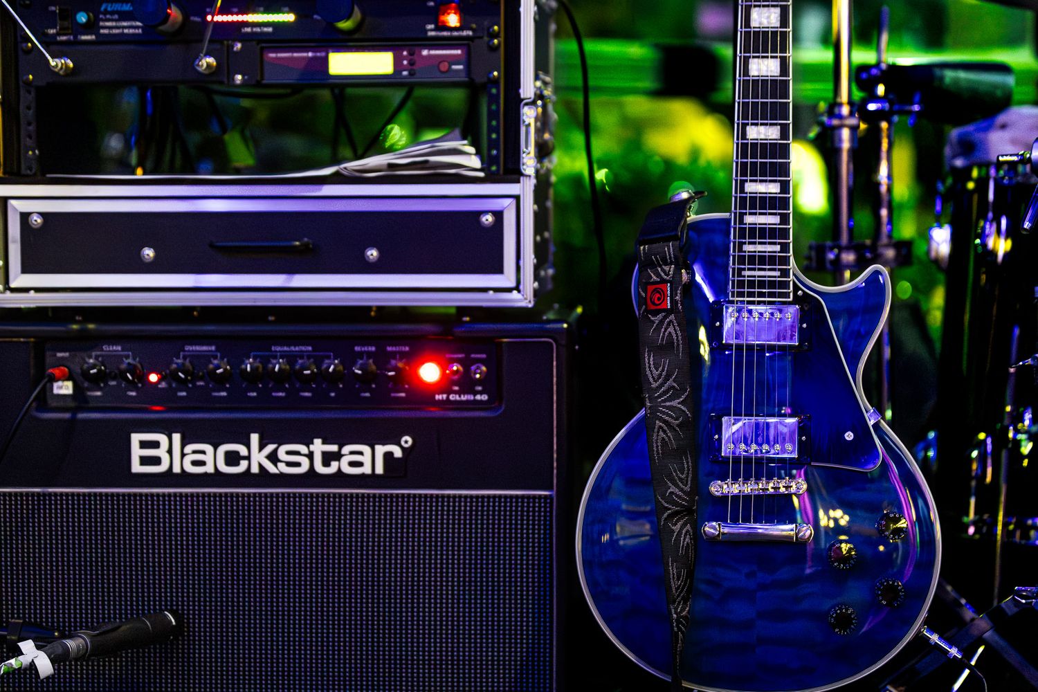 The Wrecks stage gear during a live show break, electric guitar and Blackstar amplifier under stage lighting.