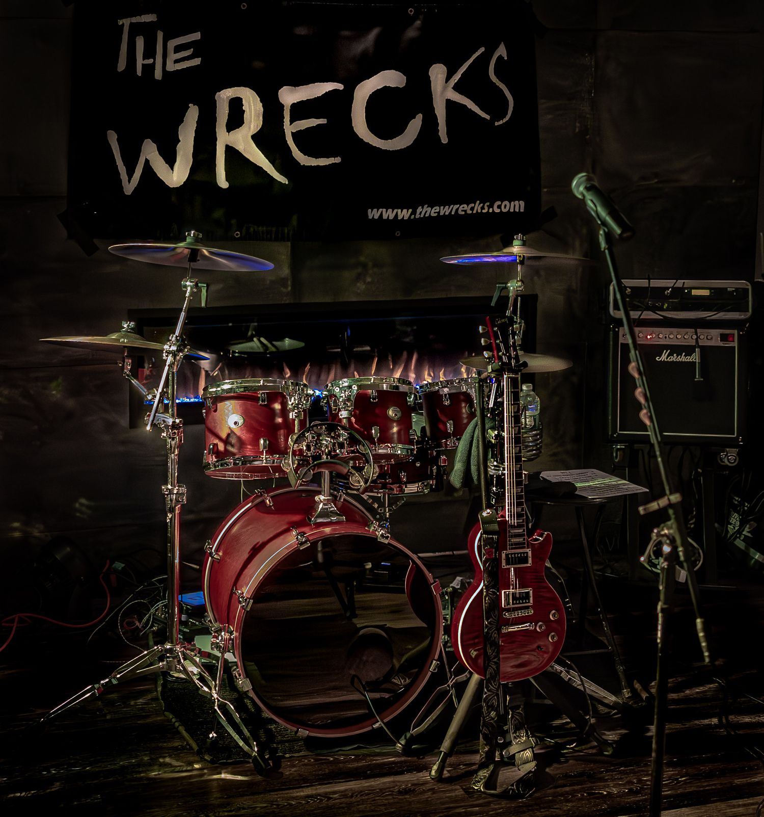 Stage gear setup for The Wrecks during a break at a live show.