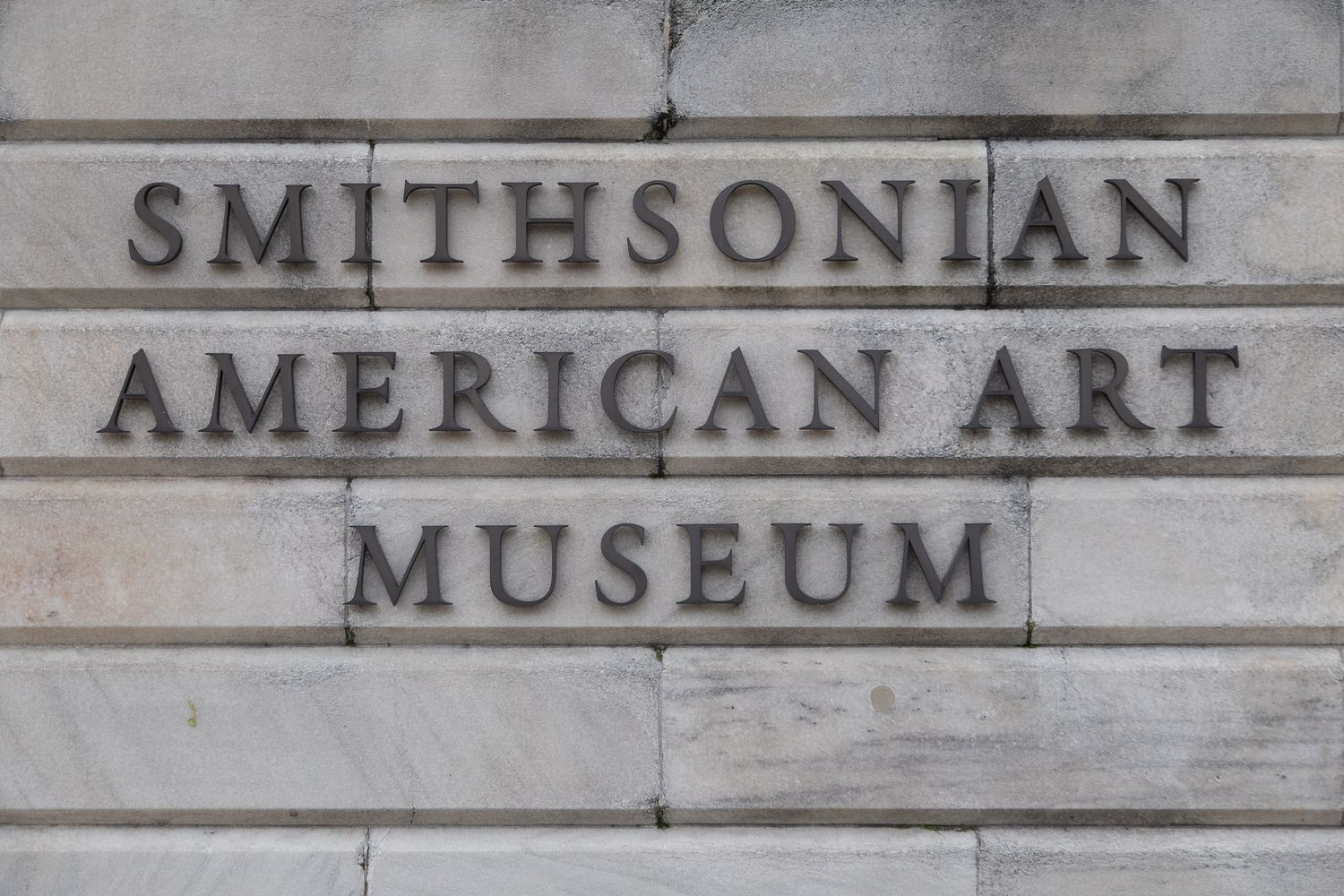 National Portrait Gallery and Smithsonian American Art Museum exterior signage in Washington DC.