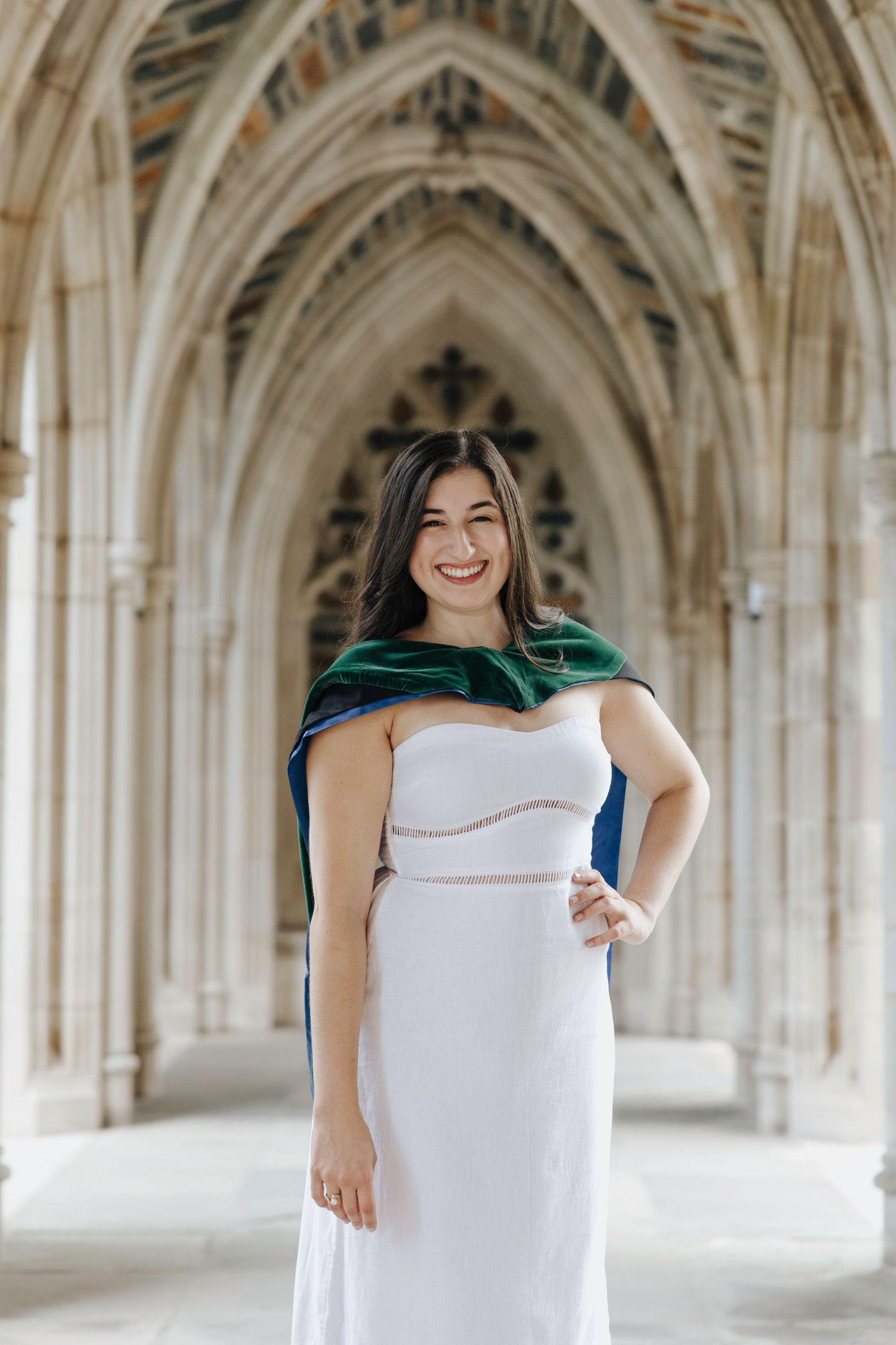 Graduate in cap and gown at Duke University campus