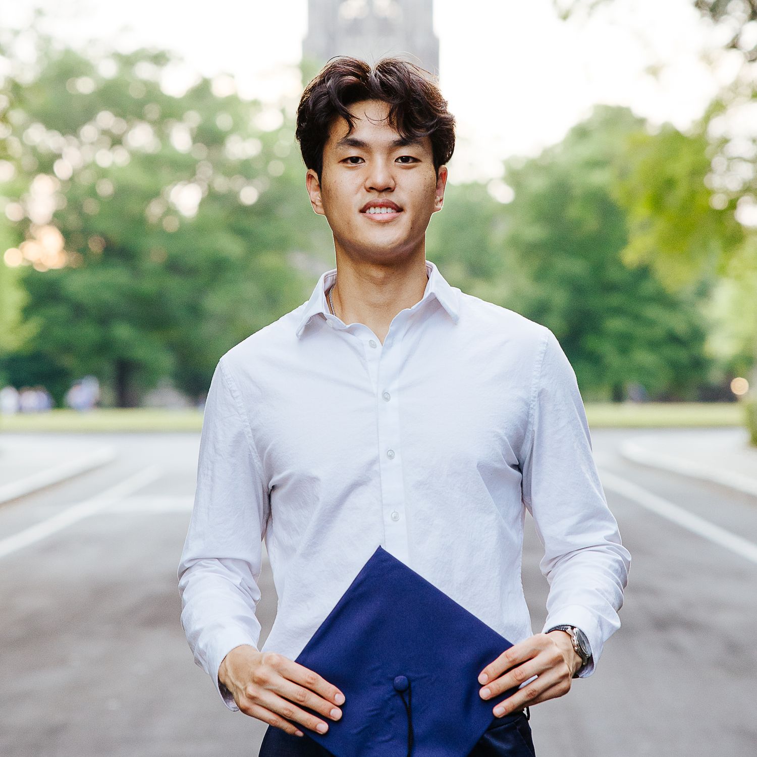 Graduate in cap and gown at Duke University campus