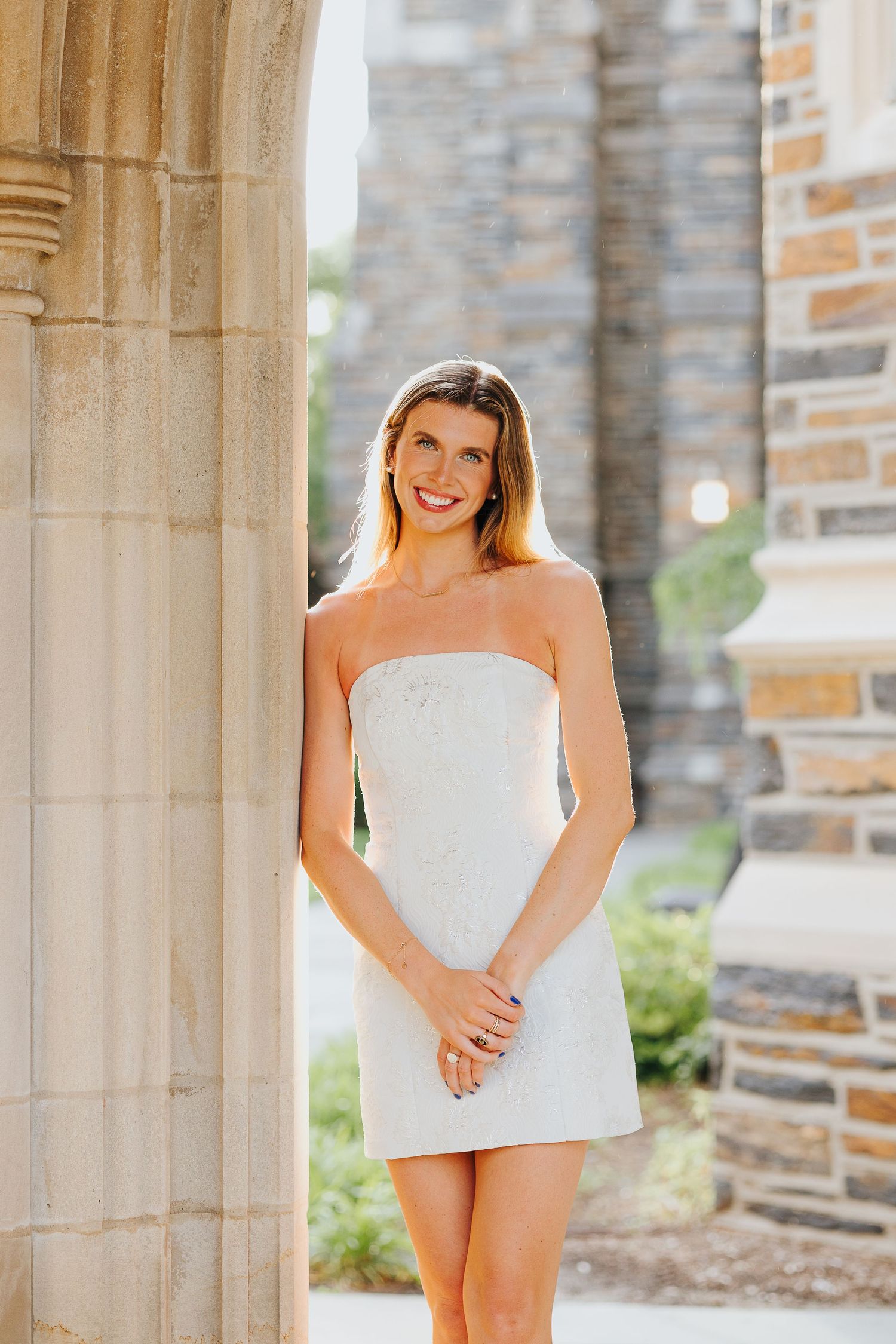 Graduate in cap and gown at Duke University campus