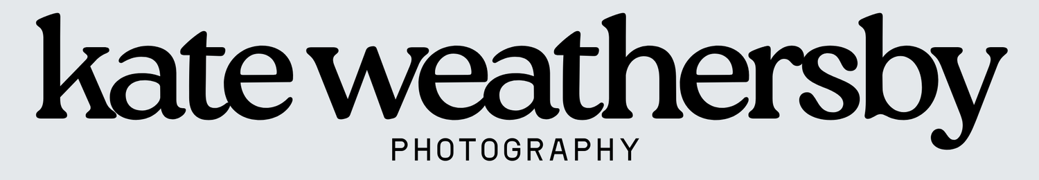Kate Weathersby Photography logo in bold black serif font on light background.