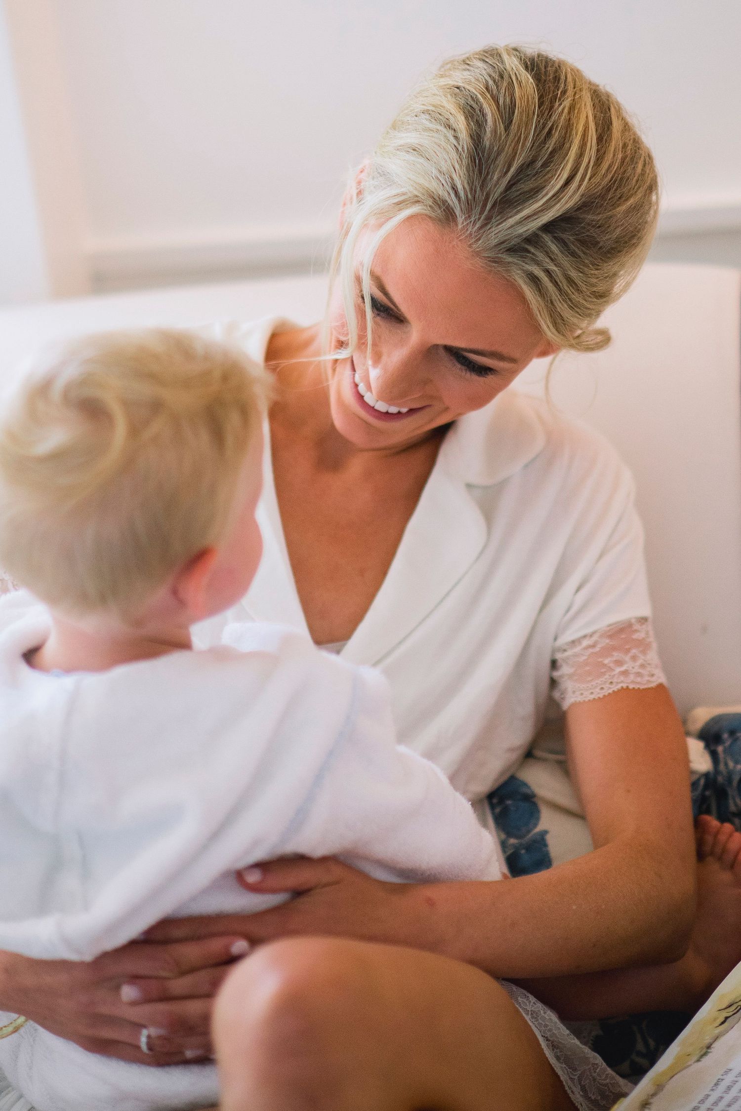 A tender series of intimate lifestyle photos showing loving family moments in soft natural light.