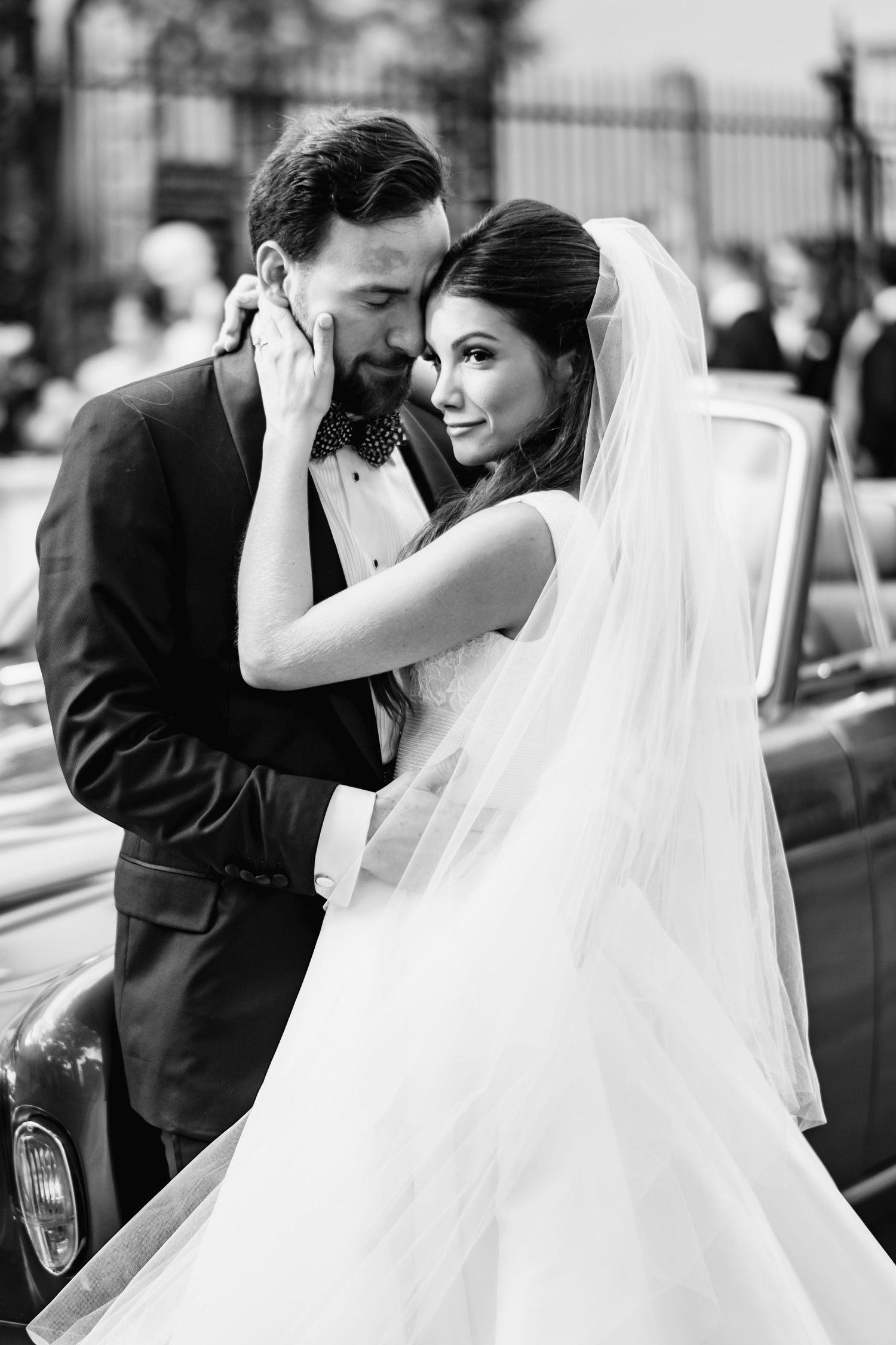 A romantic black and white series of newlyweds sharing tender moments.