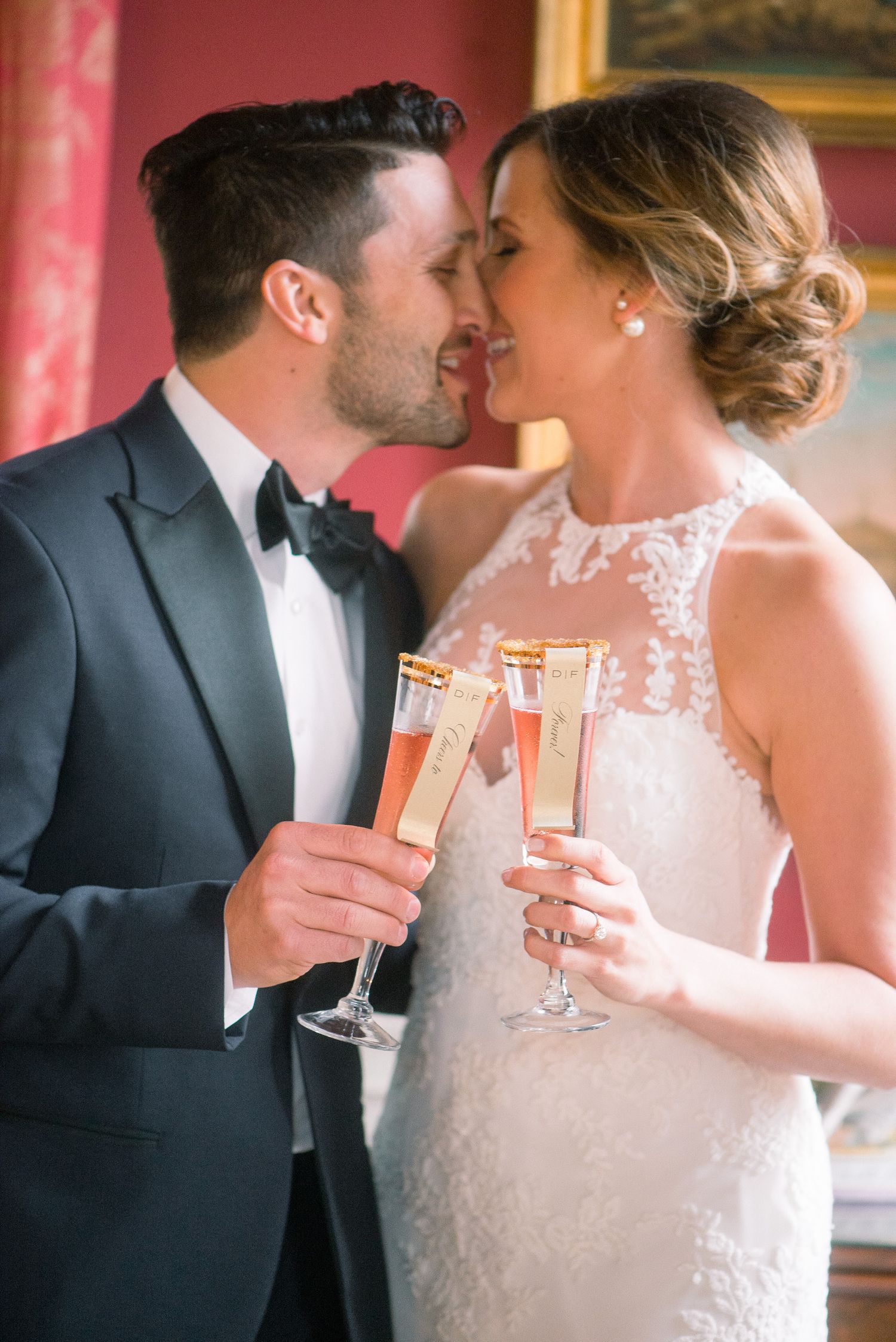 Romantic wedding couple sharing champagne toast in elegant pink-lit venue with multiple intimate moments captured.