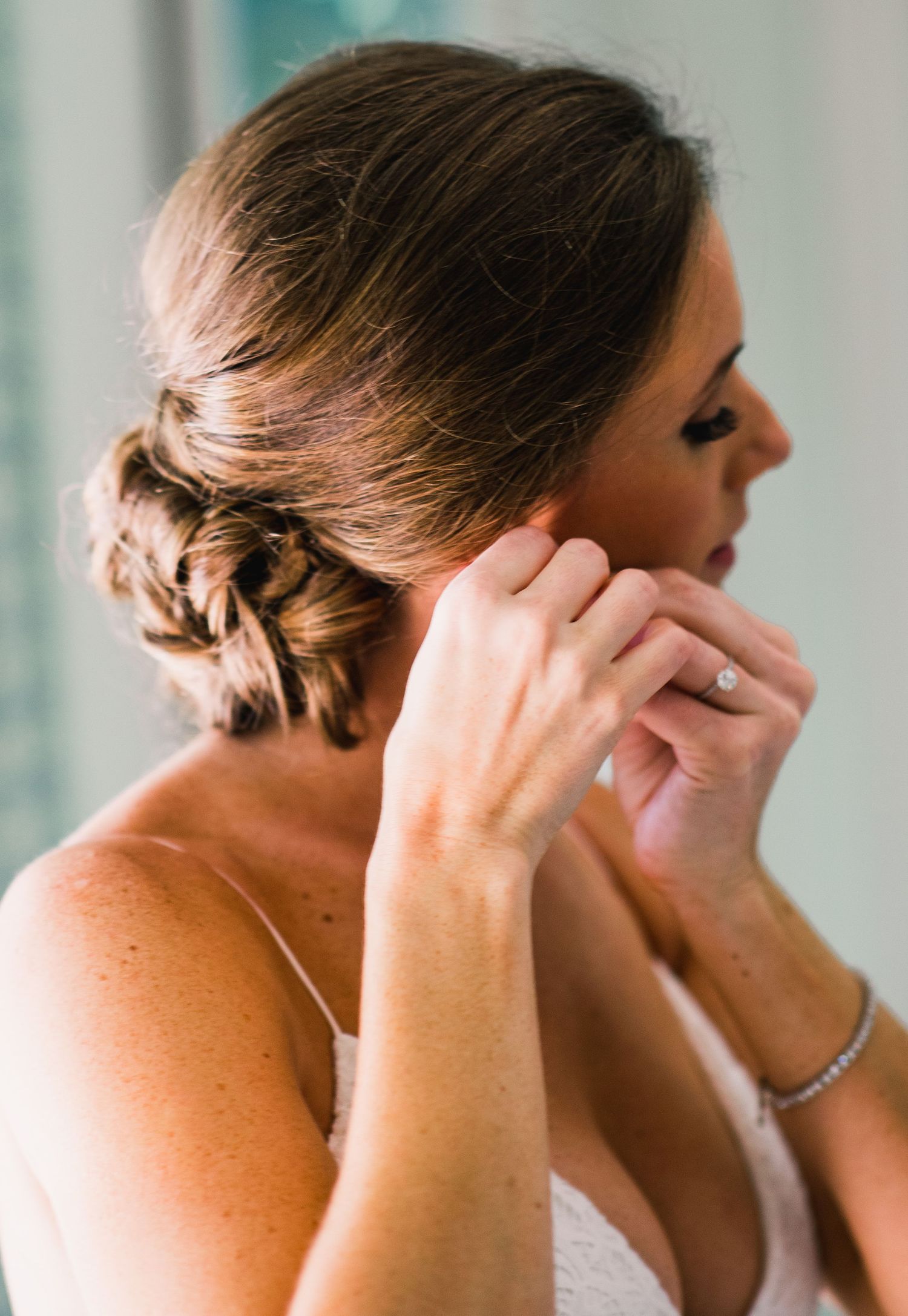 A series of profile shots showing a person in emotional distress covering their face with their hands.