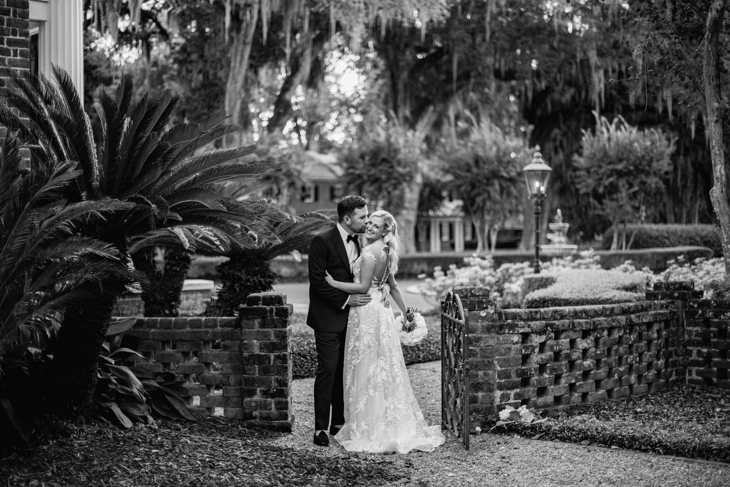 A series of black and white vintage photographs showing garden scenes with Spanish moss draped trees and landscaping.