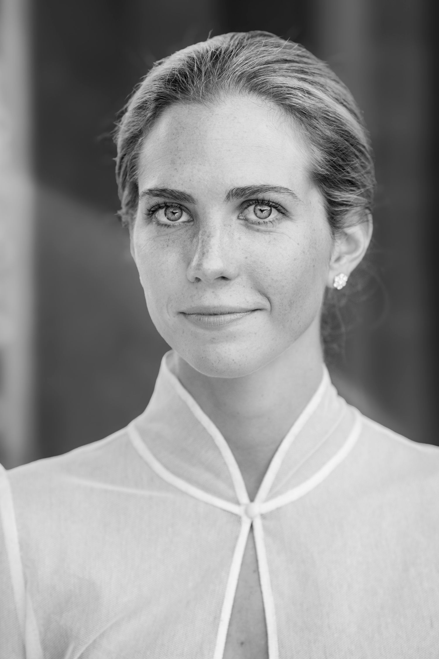 Artistic black and white portrait series showing elegant bridal details.